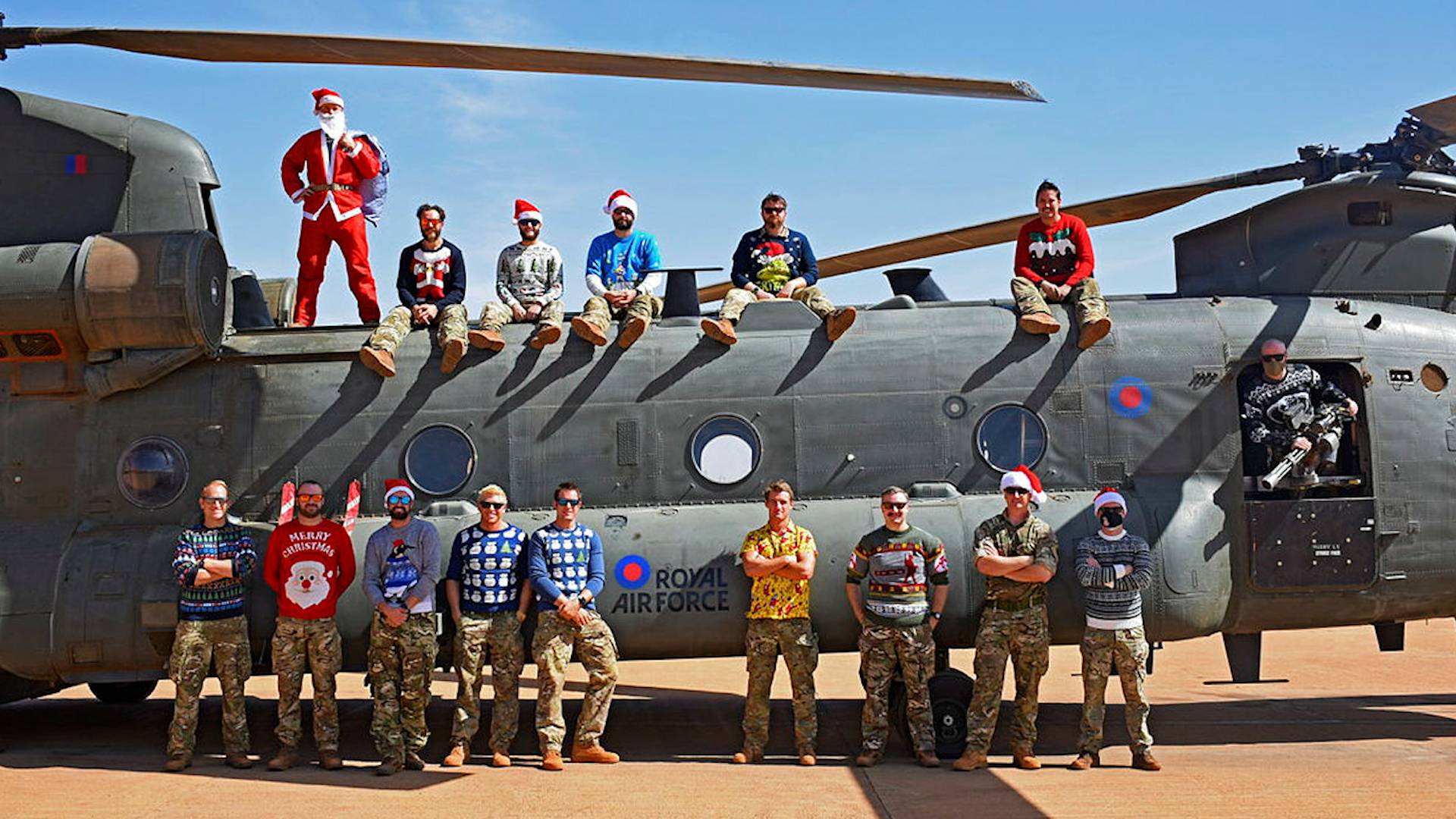 Aircrew of 1310 Flt on Op NEWCOME pose Christmas photo Chinook helicopter in Mali 120920 CREDIT MOD