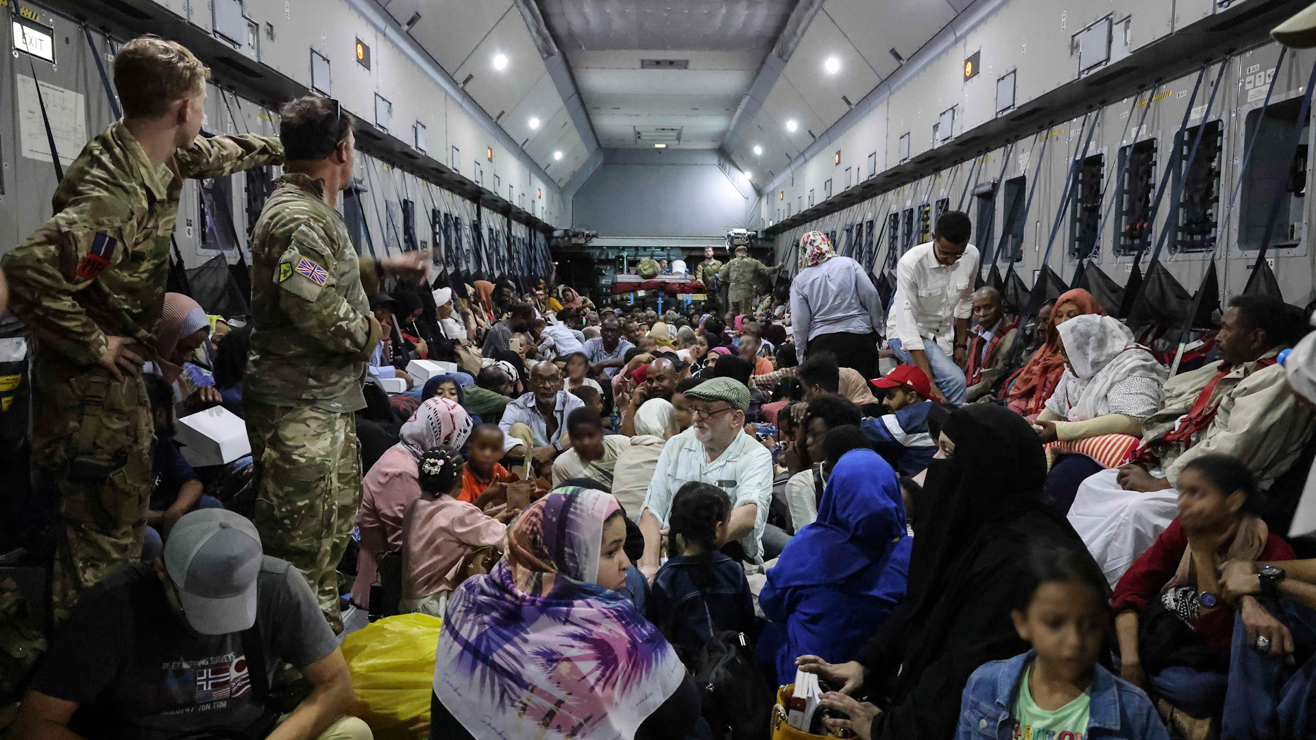 British nationals on board an RAF aircraft being evacuated out of Sudan
