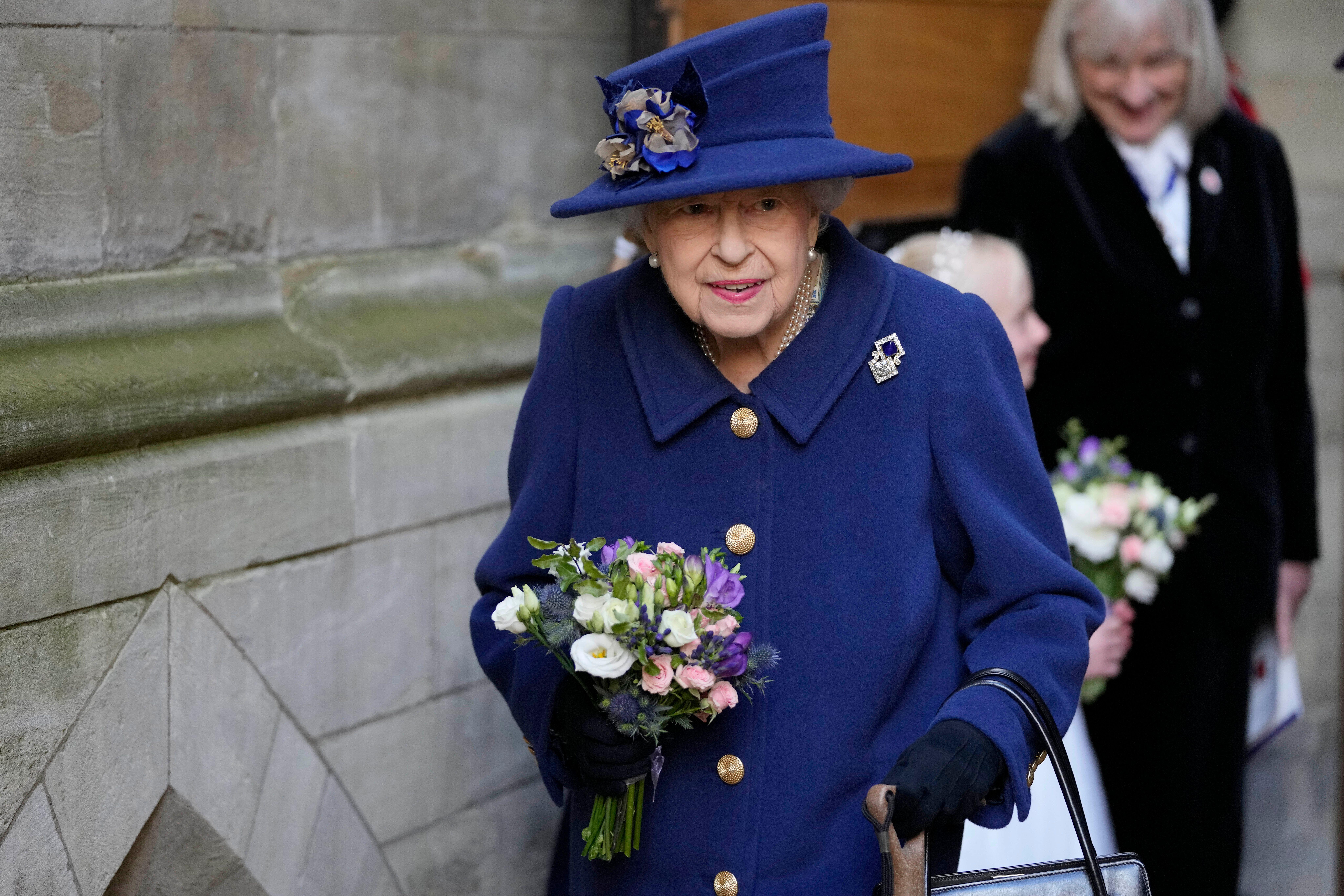 Queen Elizabeth II leaves after attending a Service of Thanksgiving at Westminster Abbey in London to mark the Centenary of the Royal British Legion (Picture: PA/Alamy).