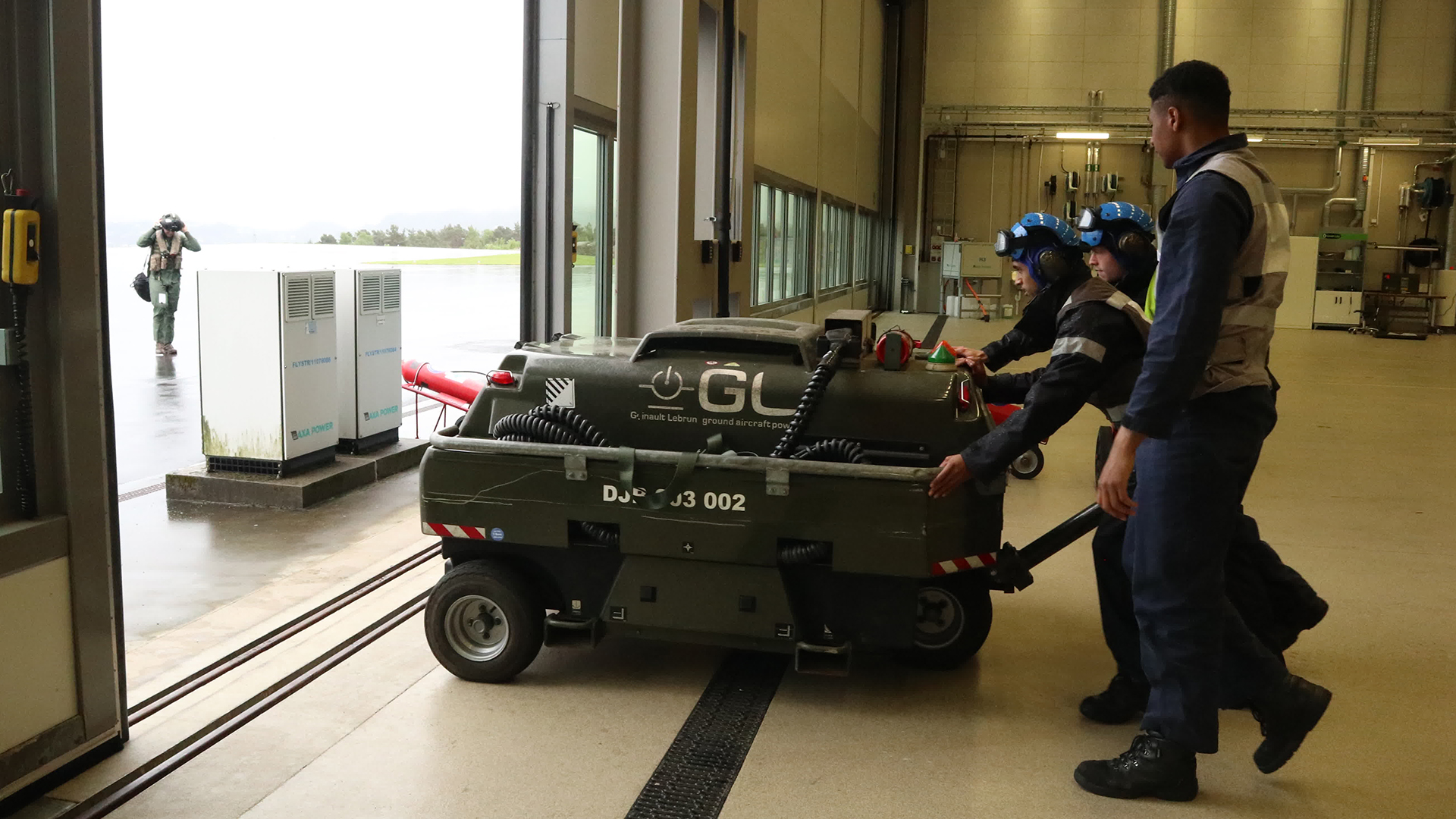 Green Eel provided a good test for the ground crews too, like these men seen here wheeling out a ground power unit to help start up the helicopters (Picture: MOD)