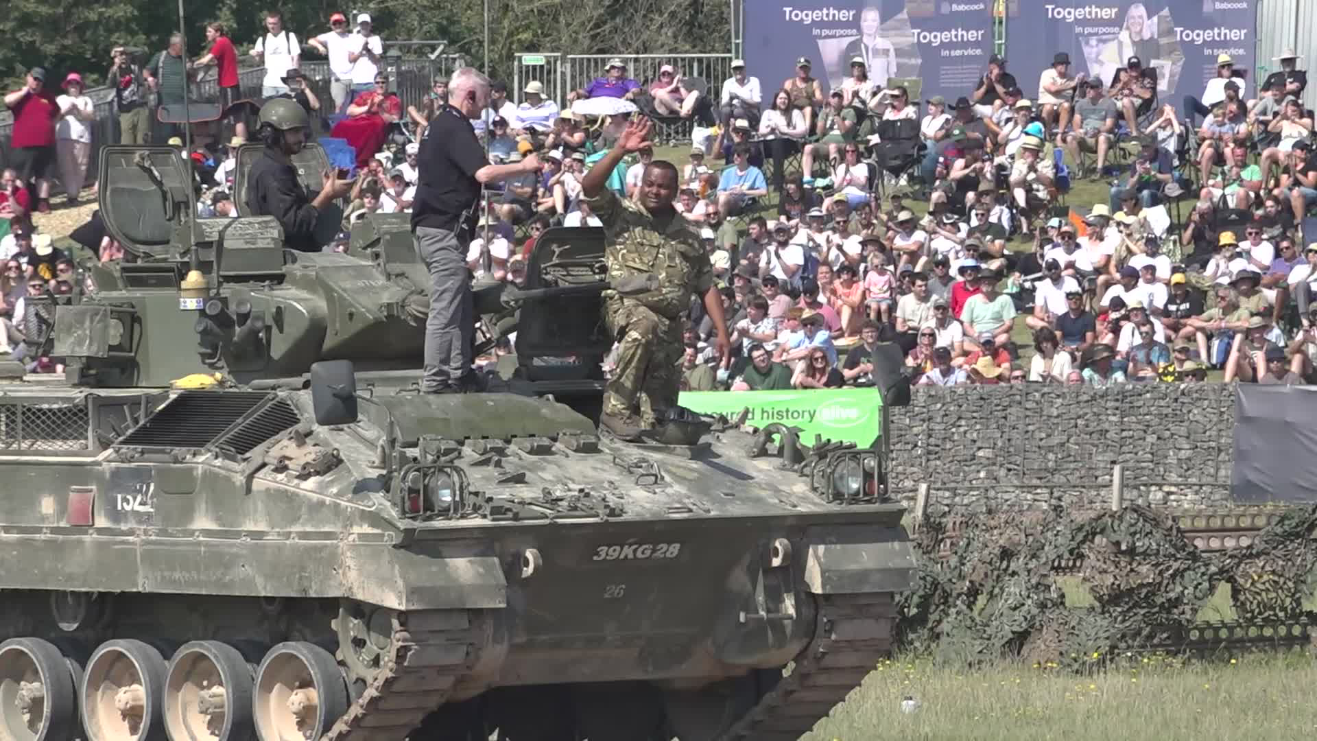WO1 Beharry waves to the crowd after getting out of the driver's station and removing his helmet (Picture: BFBS)