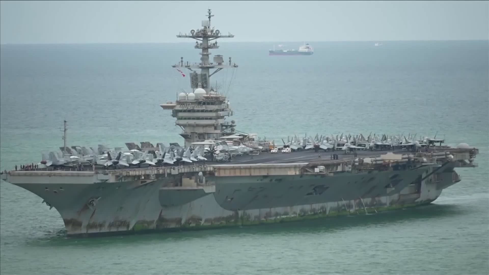 After over 200 days at sea, U.S. aircraft carrier arrives in Thailand looking like it needs a paint job
