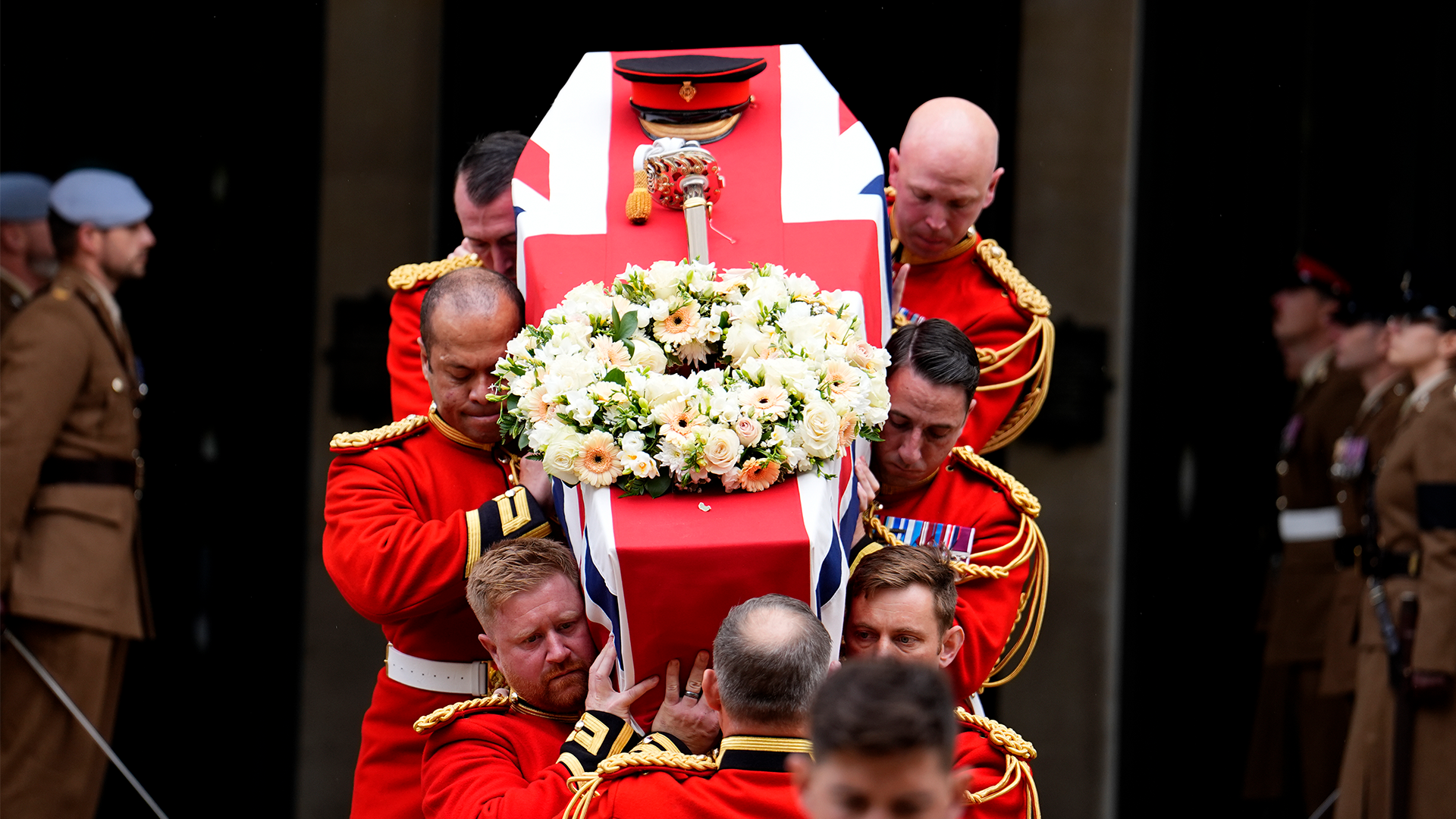 02102025 The Bearer Party carry the coffin after the funeral for Captain Elizabeth Godwin, at the Guards Chapel, Wellington Barracks, London CRED PA