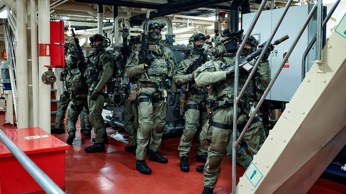 The commandos conducted boarding drills on the Faroese fishing vessel, Gotunes FD 950 (Picture: MOD)