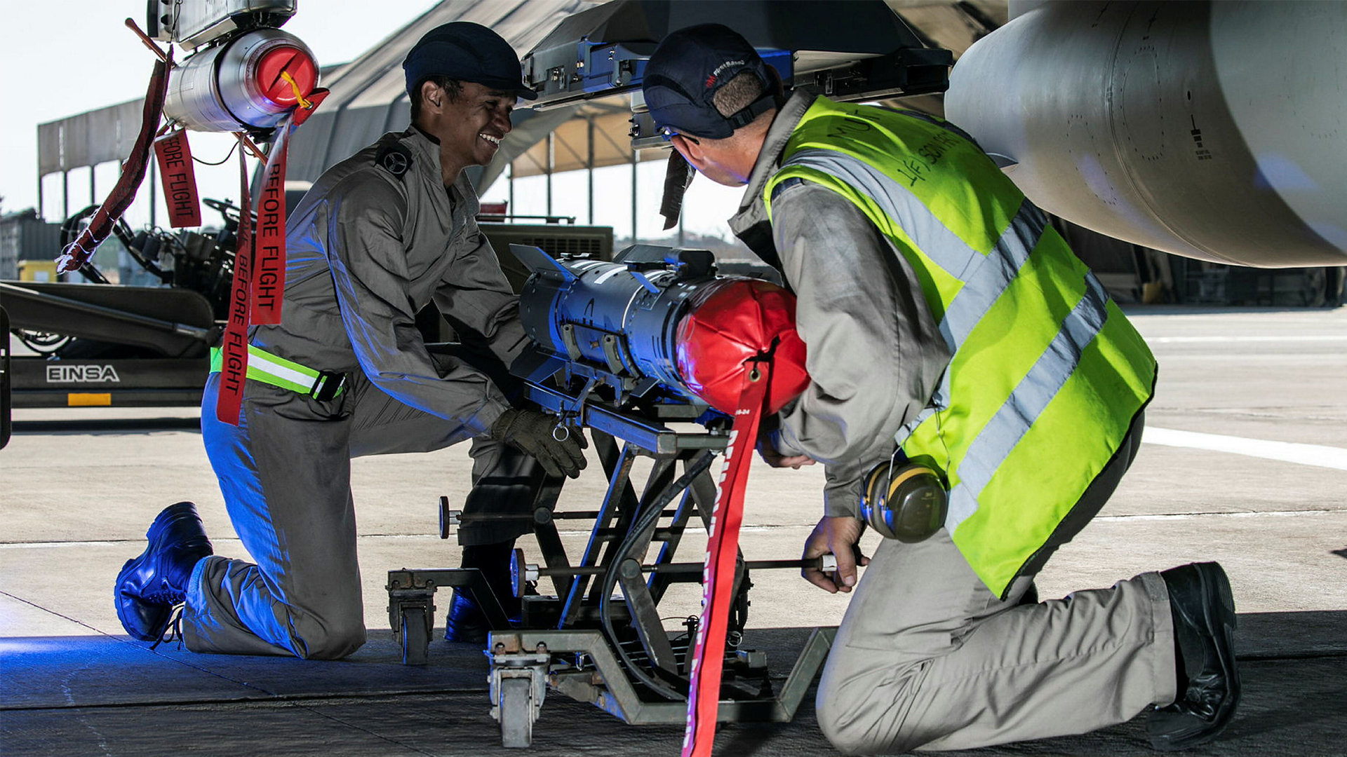 Weapons technicians work on a Typhoon FGR.Mk 4 at RAF Akrotiri, replacing any munitions to ensure the aircraft can conduct any mission required of it