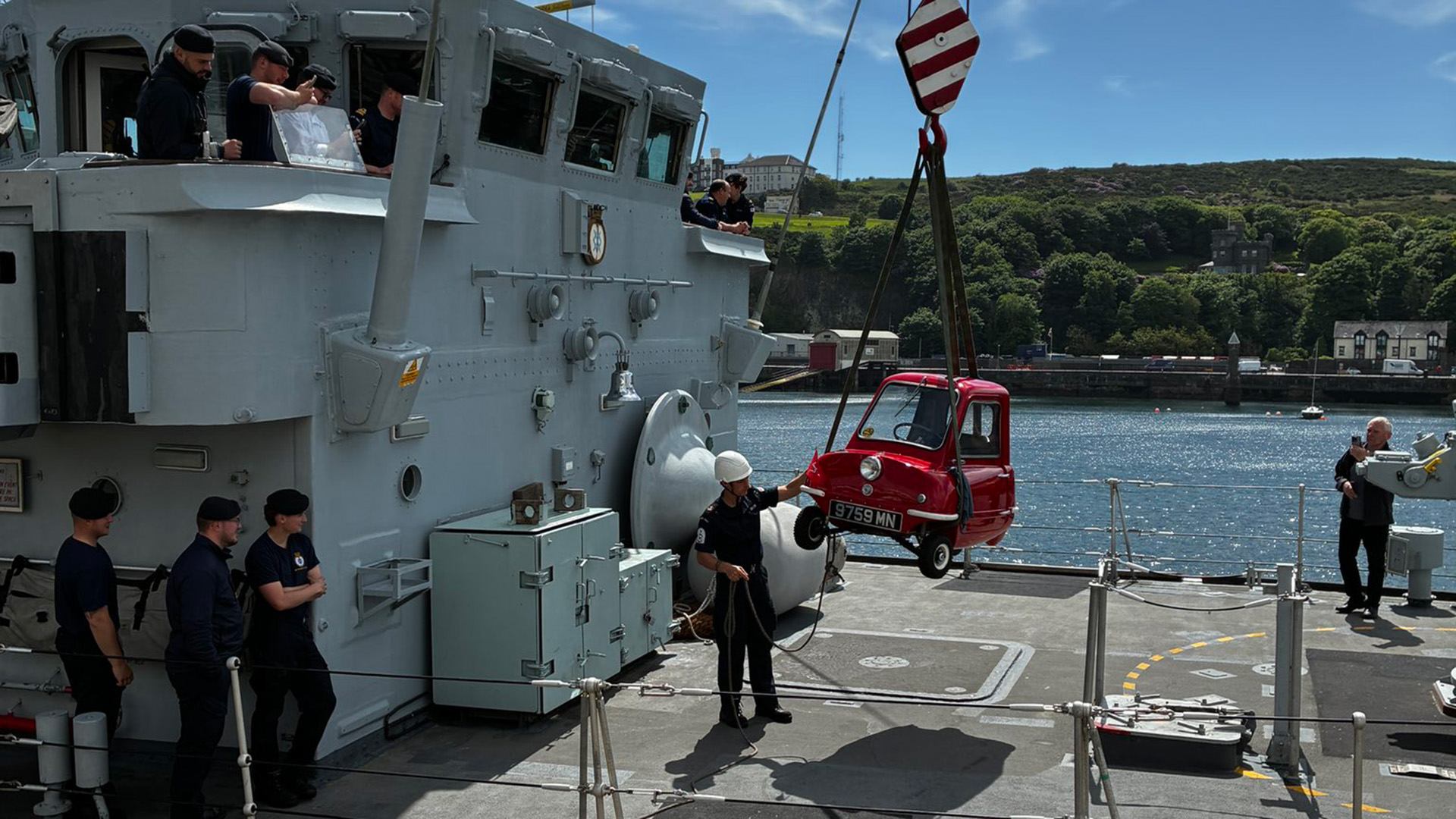 HMS Middleton's crew use a crane to lift the Peel P50 (Picture: HMS Middleton X)