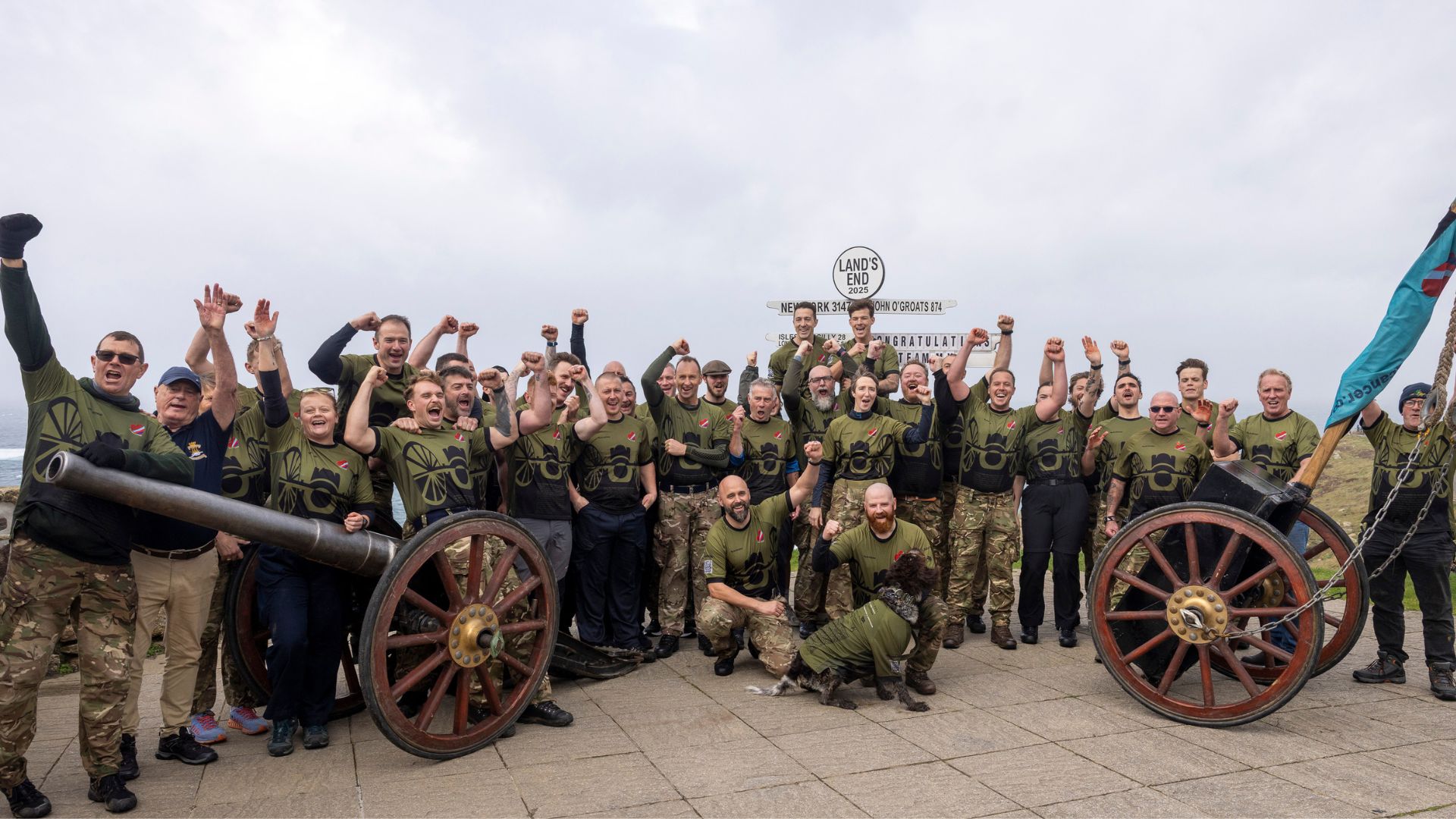 Big cheers as the team of volunteers finished off their epic challenge in Land's End, Cornwall
