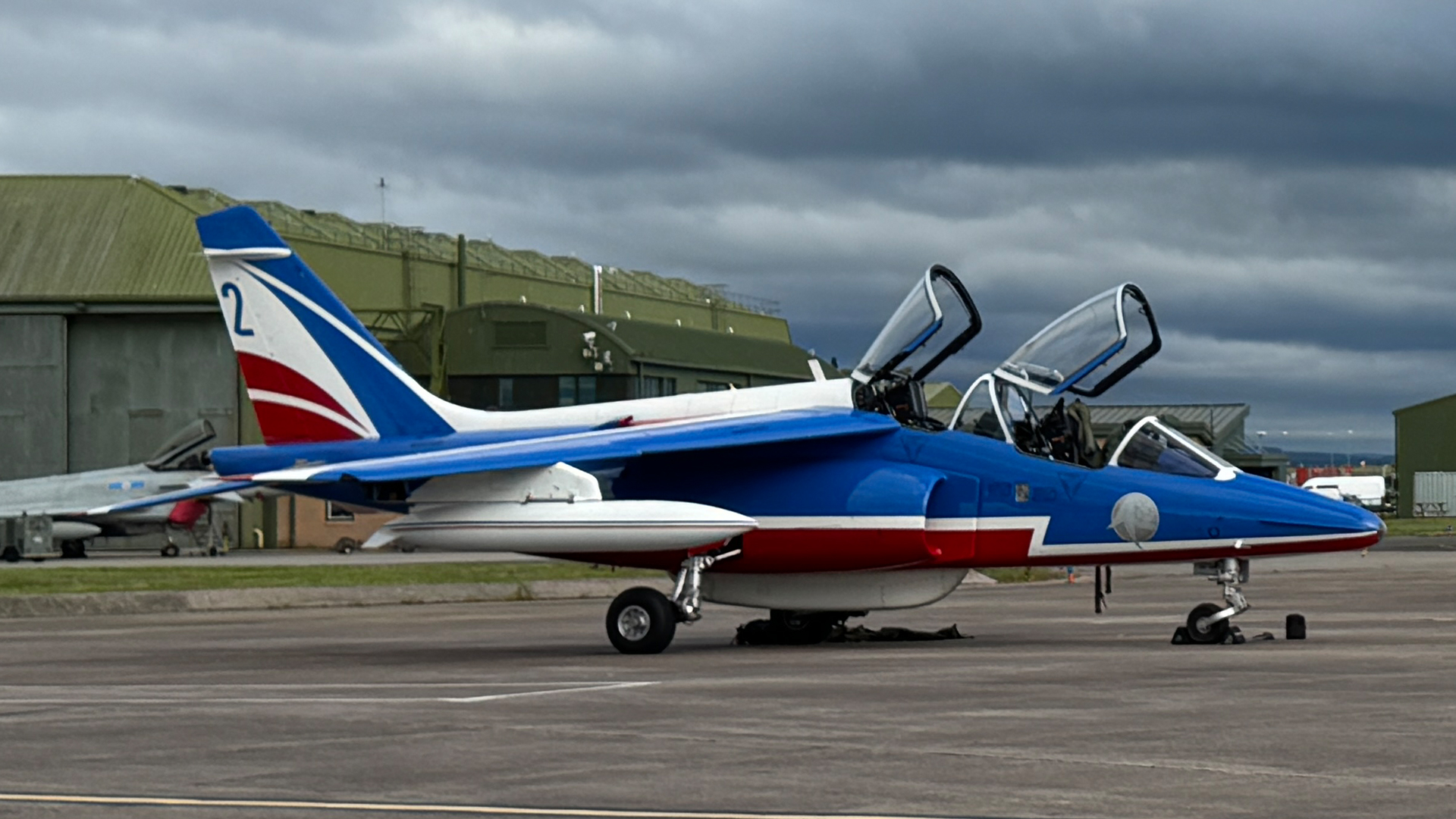 The Alpha Jets parked in front of one of RAF Lossiemouth's full-time residents - a Typhoon FGR4 on Quick Reaction Alert duties (Picture: BFBS)