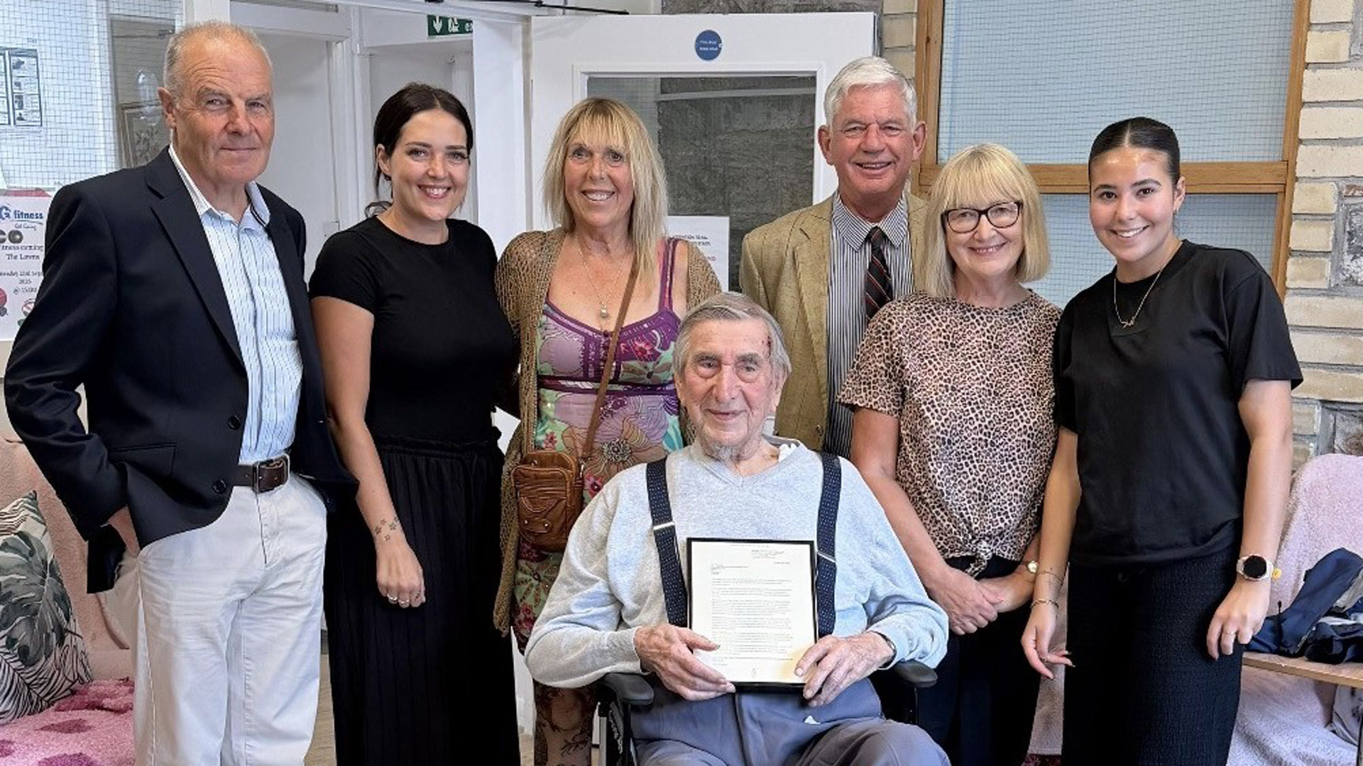 With Fred Bickham are Giles Ebbutt (right), Chair of the Yealm branch of the Royal British Legion in Devon, Tim Harbinson (left) and his family (Picture: Royal Navy)