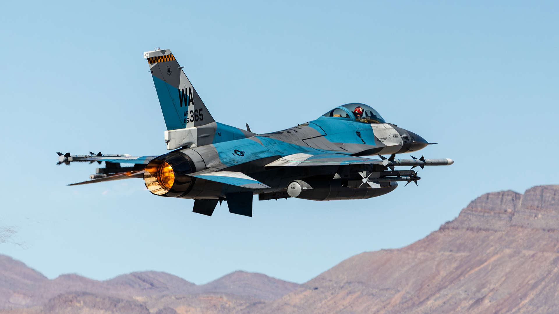 The F-16, despite its advanced years, is still vital to US air power - this example being used to simulate an aggressor during a practice enemy engagement (Picture: MOD)