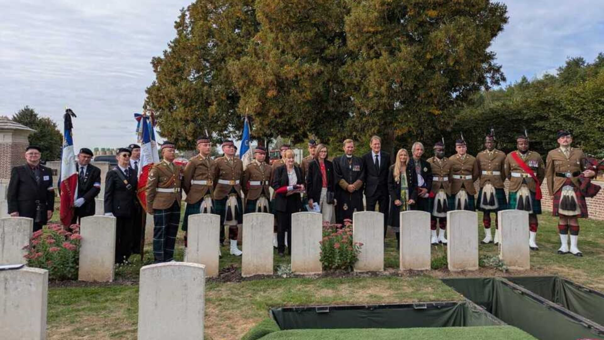 The military party, families of the Pte Brock and Pte Todd, and local standard bearers at the graveside (Picture: Crown Copyright)
