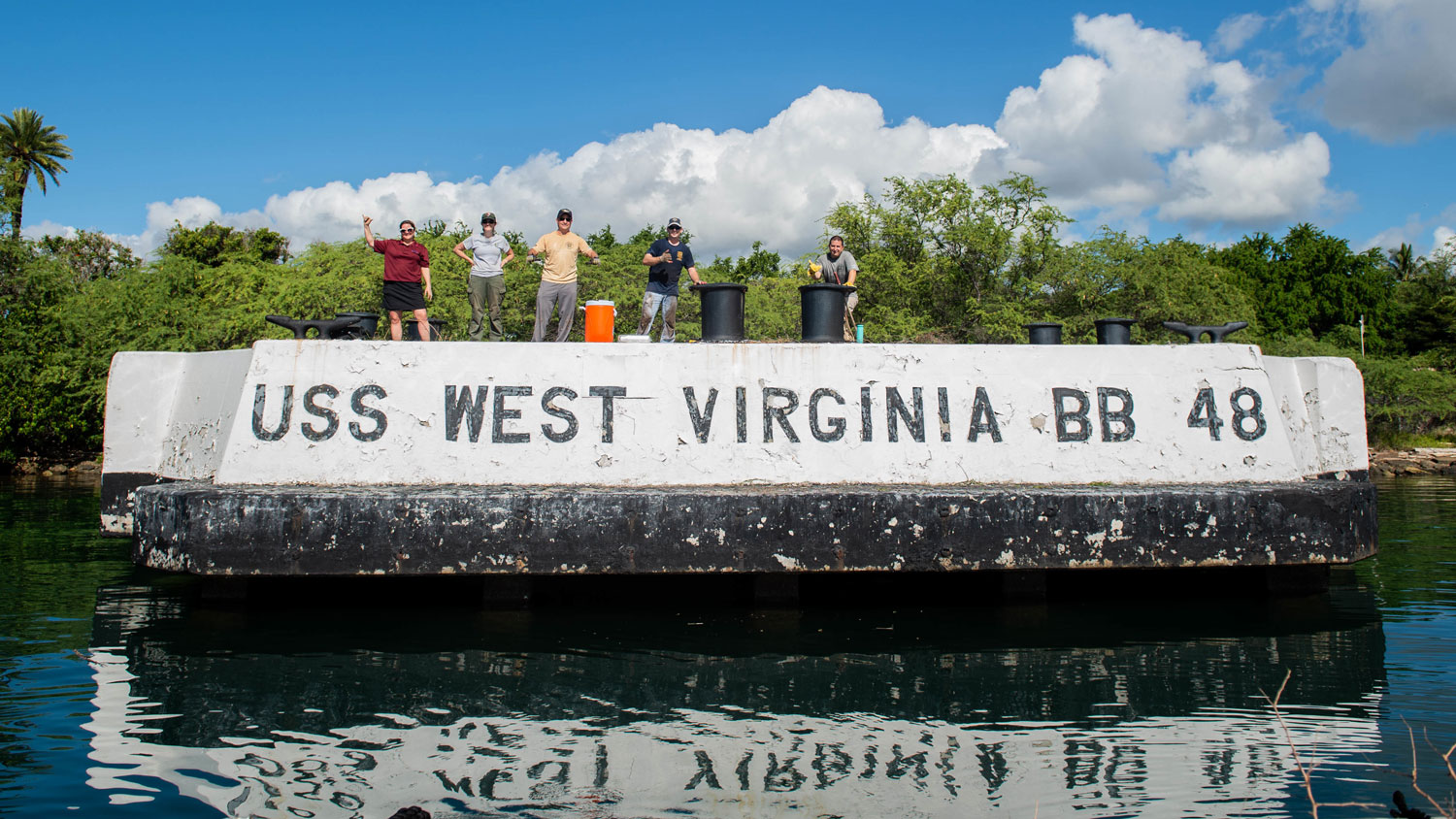051225 sailors clean up USS West Virginia quay at USS Arizona Memorial in Oct 2019. The quays were used to moor battleships along Battleship Row on the southeast side of Ford island CREDIT US Navy