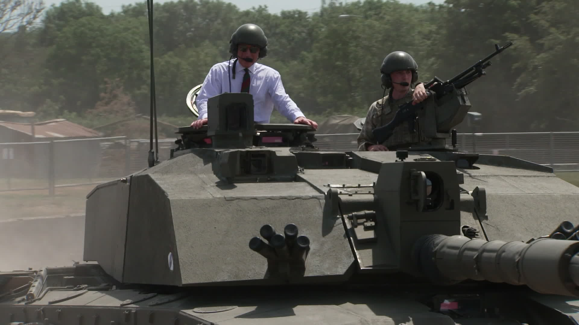 King Charles takes a ride in a Challenger 2 as he visits the Royal Tank Regiment for the first time as its Colonel-in-Chief (Picture: BFBS)