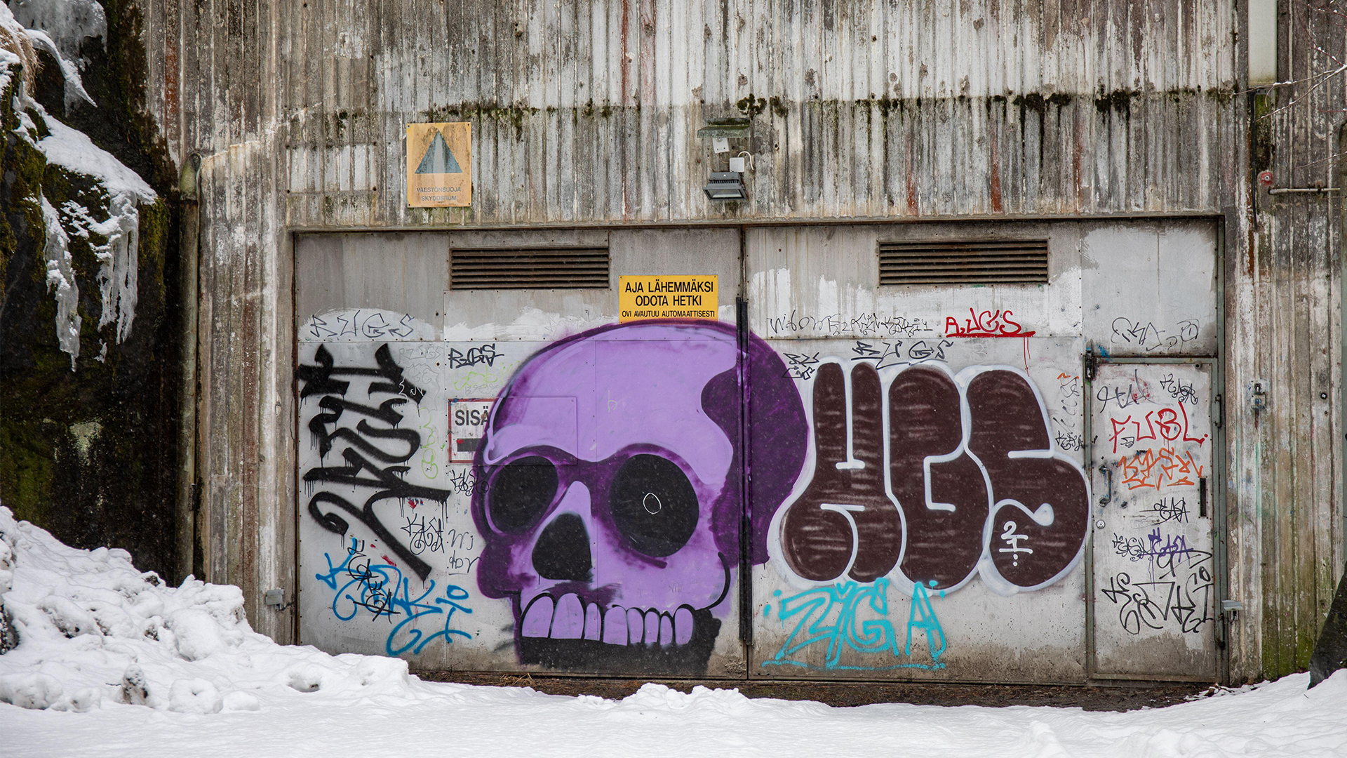 The graffiti artists tagging the entrace to this underground civil defence shelter in Helsinki probably never imagined it might be needed for real one day (Picture: Alamy)