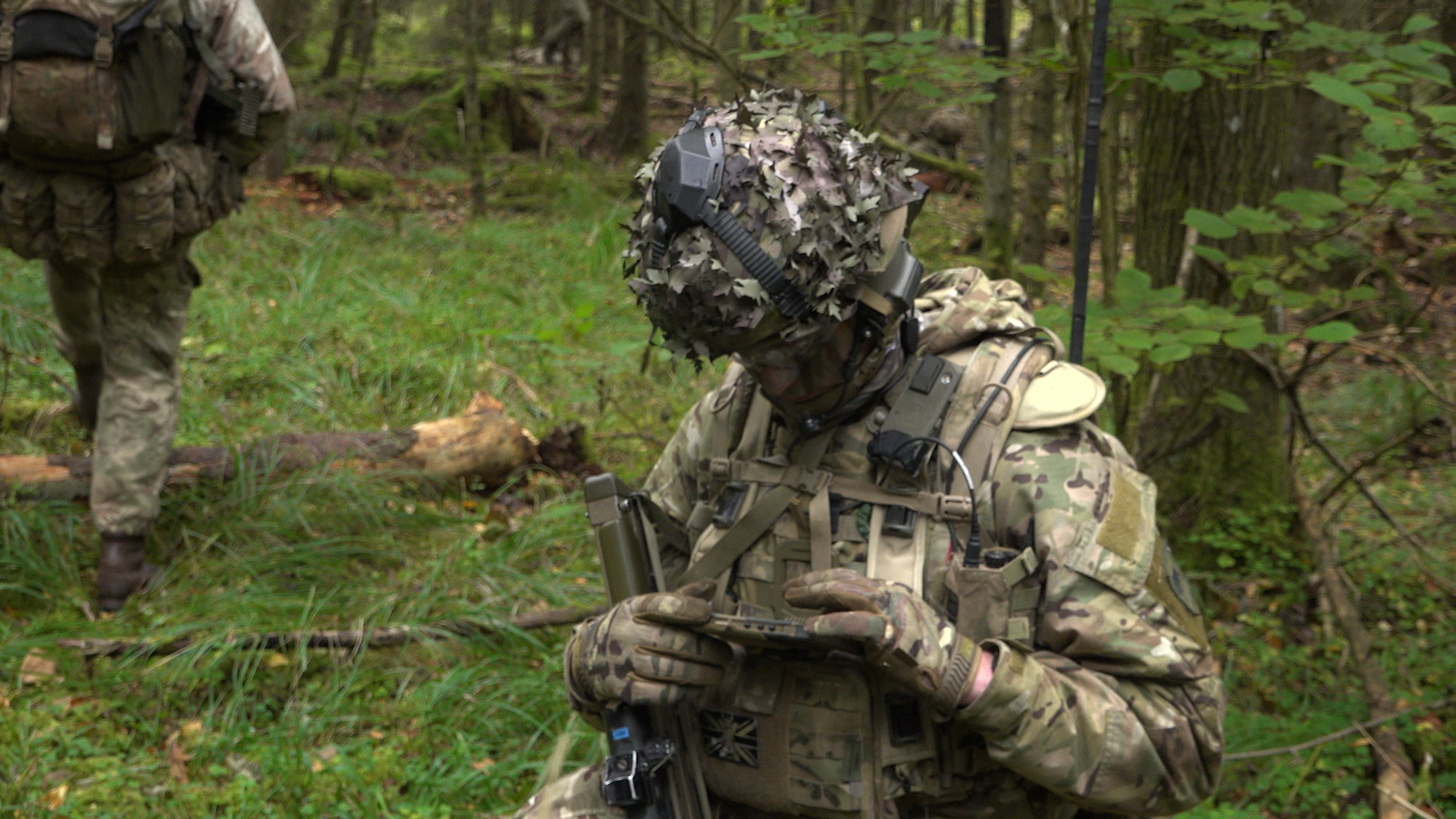 A soldier from 3 SCOTS using an ATAK tablet during Exercise forest Guardian in Latvia