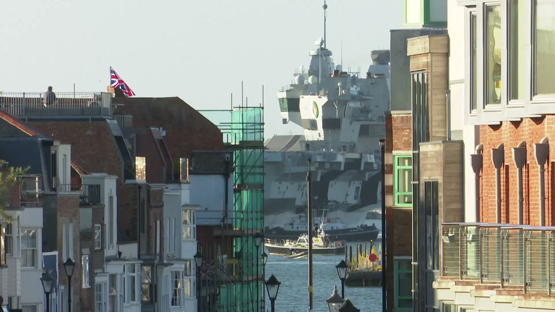 For a few fleeting seconds, the sight of HMS Queen Elizabeth could be seen through the narrow streets of Old Portsmouth (Picture: BFBS)