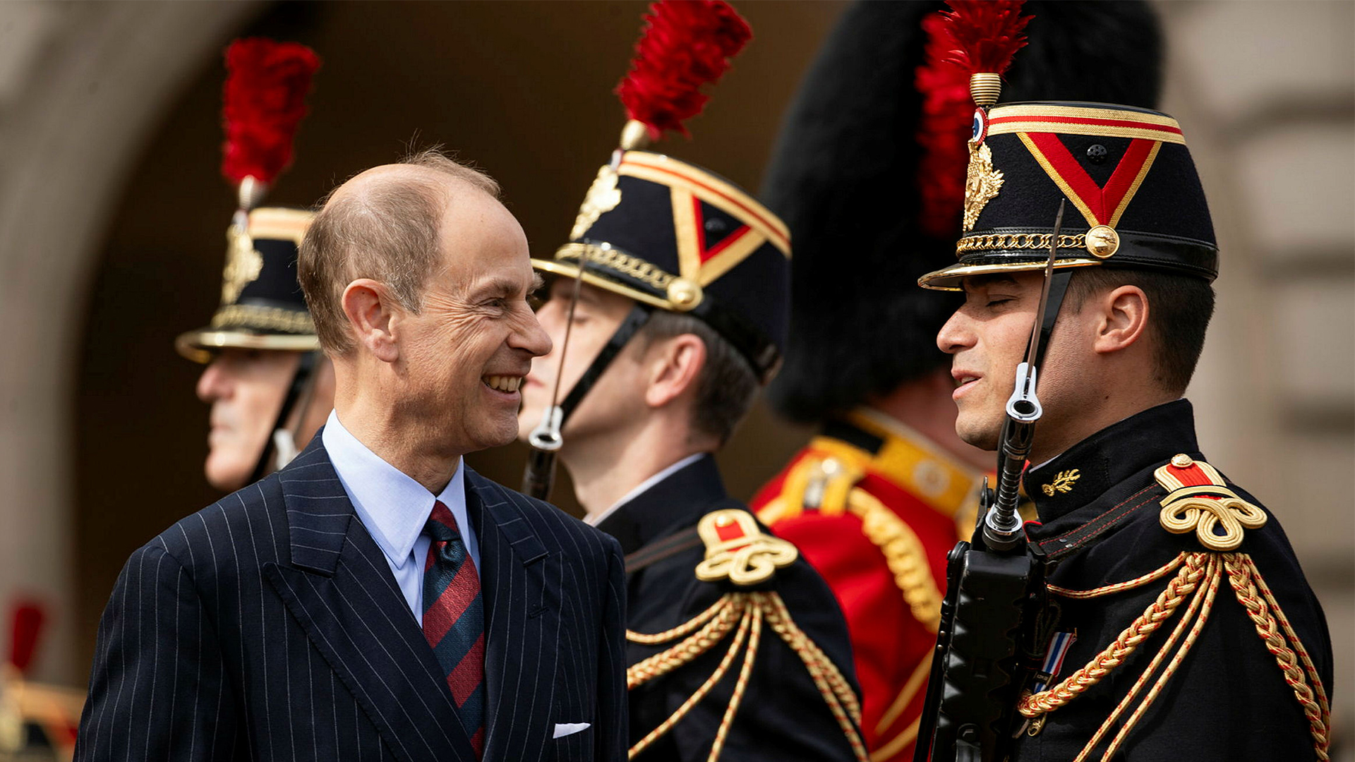 Foreign units are sometimes invited to participate - in this case the Duke of Edinburgh speaks to members of the French Garde Républicaine
