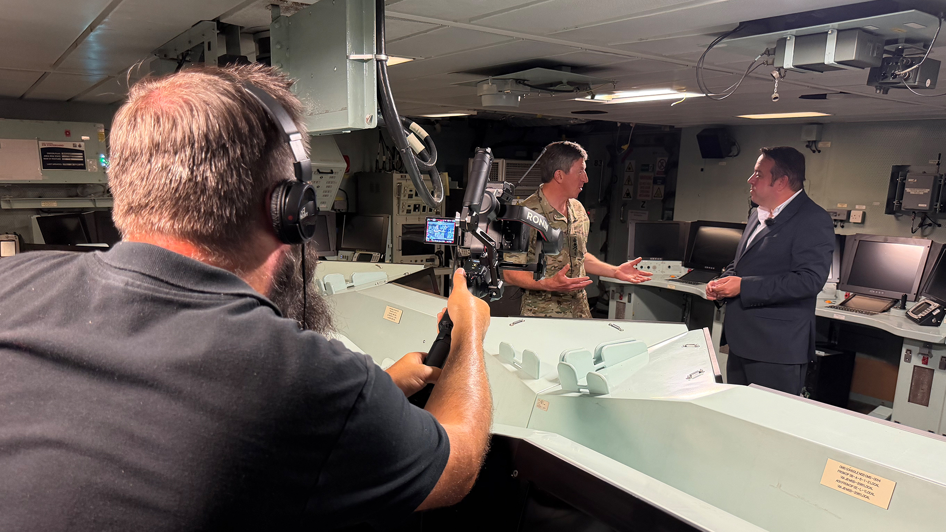 Tim Cooper and Gen Sir Gwyn were filmed walking and talking through various areas of the air defence vessel - all in a single take (Picture: BFBS)