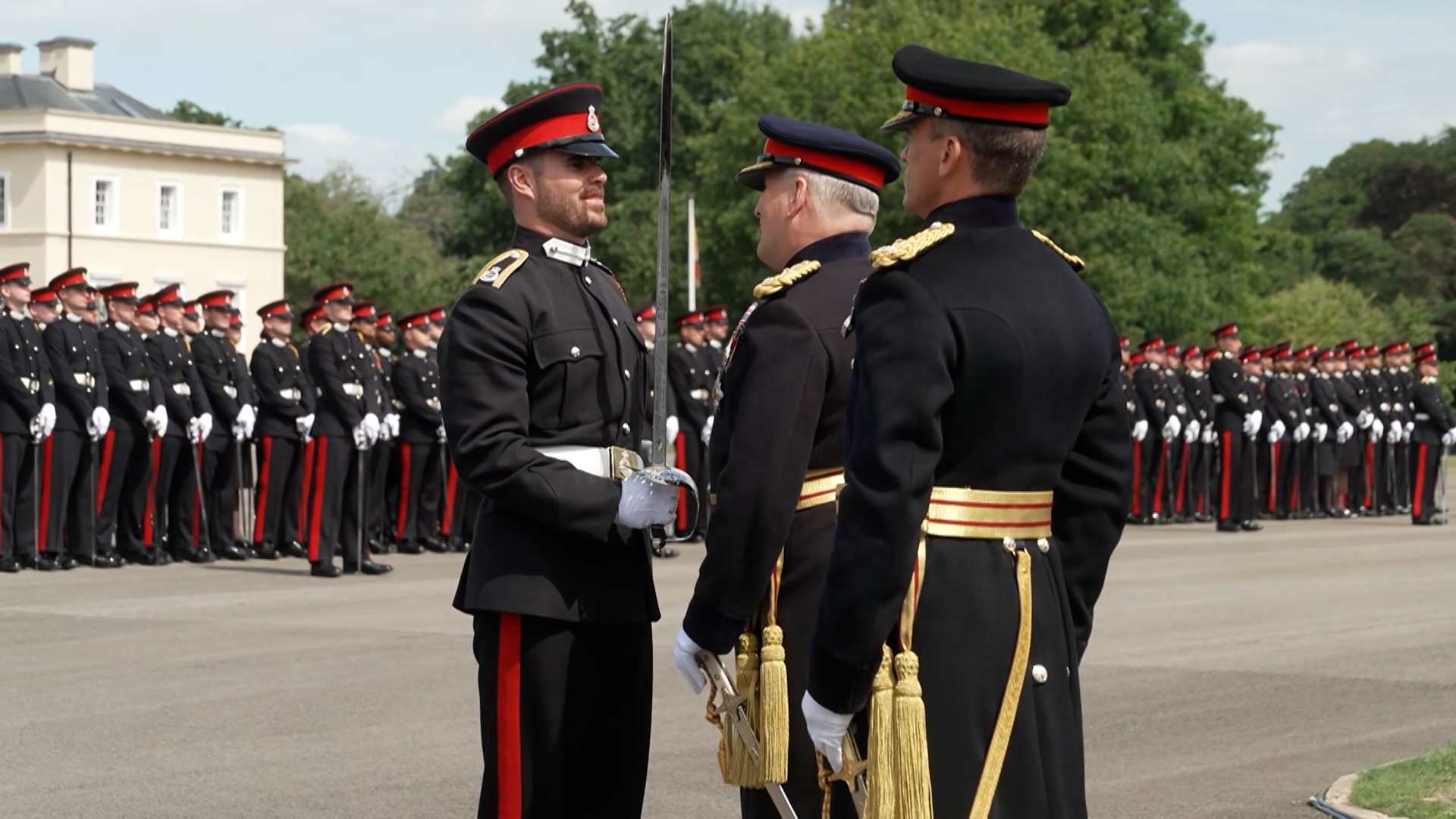 Senior Under Officer Charlie Hubbard is presented with the Sword of Honour