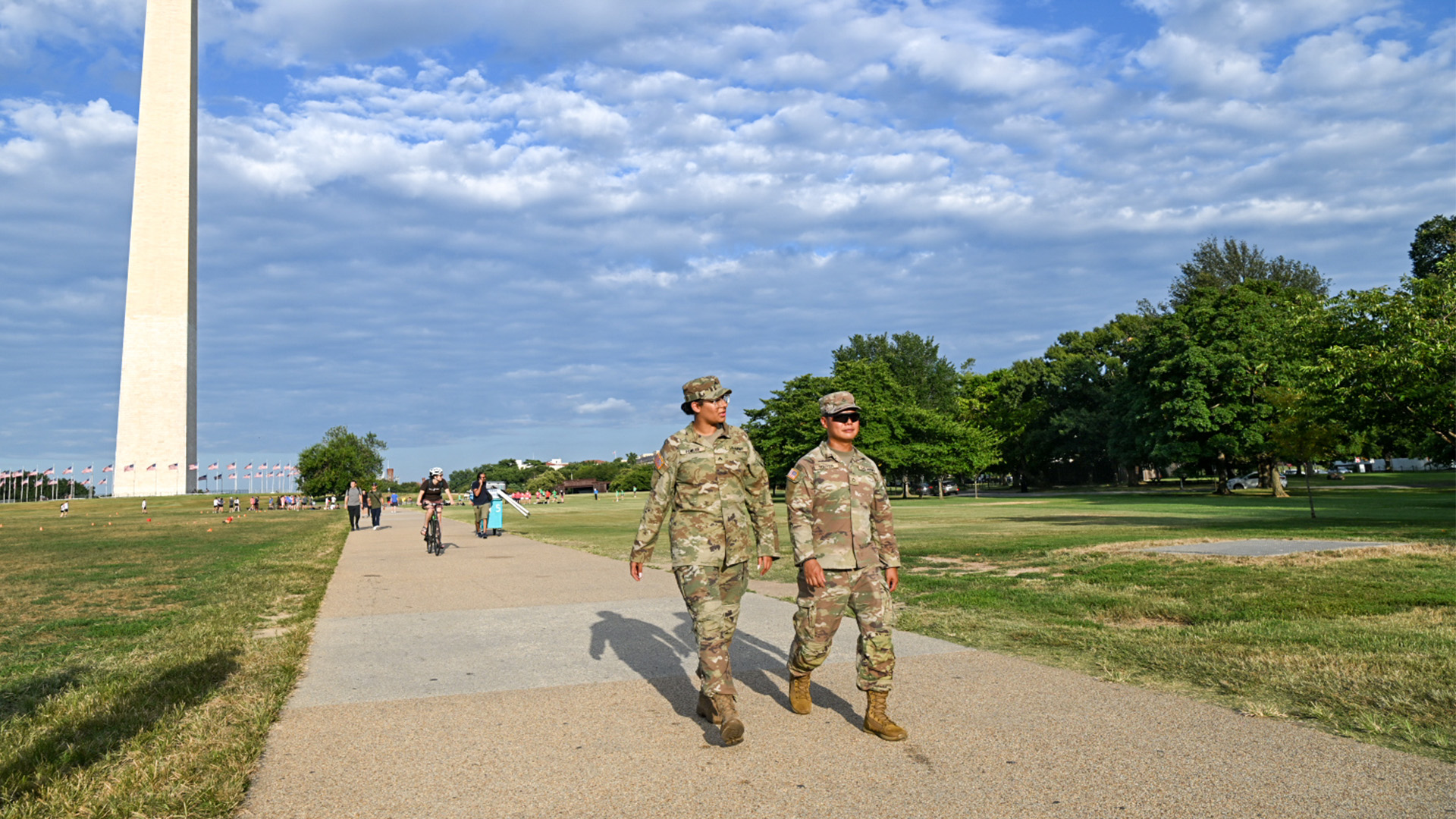 Soldiers from the US National Guard patrol by the National Mall in Washington DC