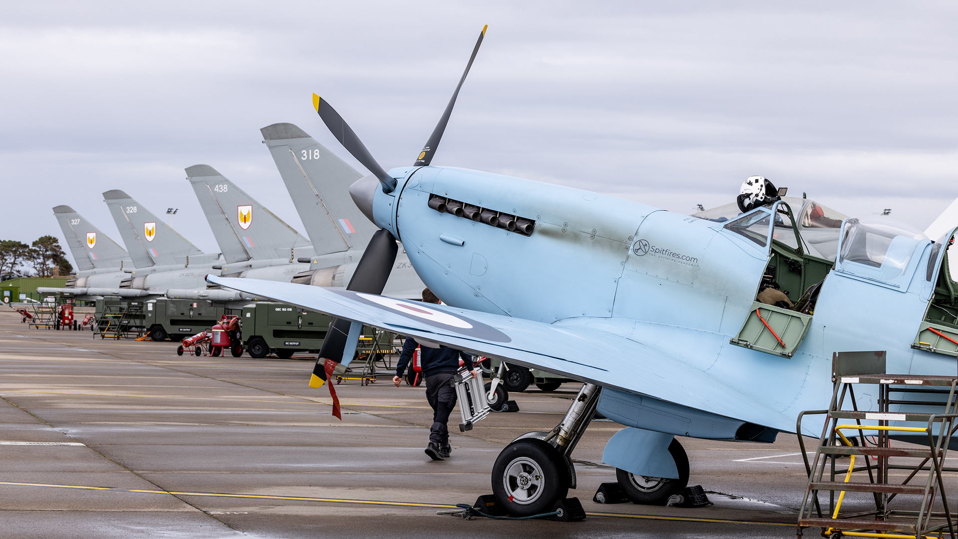 The Spitfire TR9 parked up alongside its modern counterparts at RAF Lossiemouth on the third leg of its Spitfire90 anniversary tour