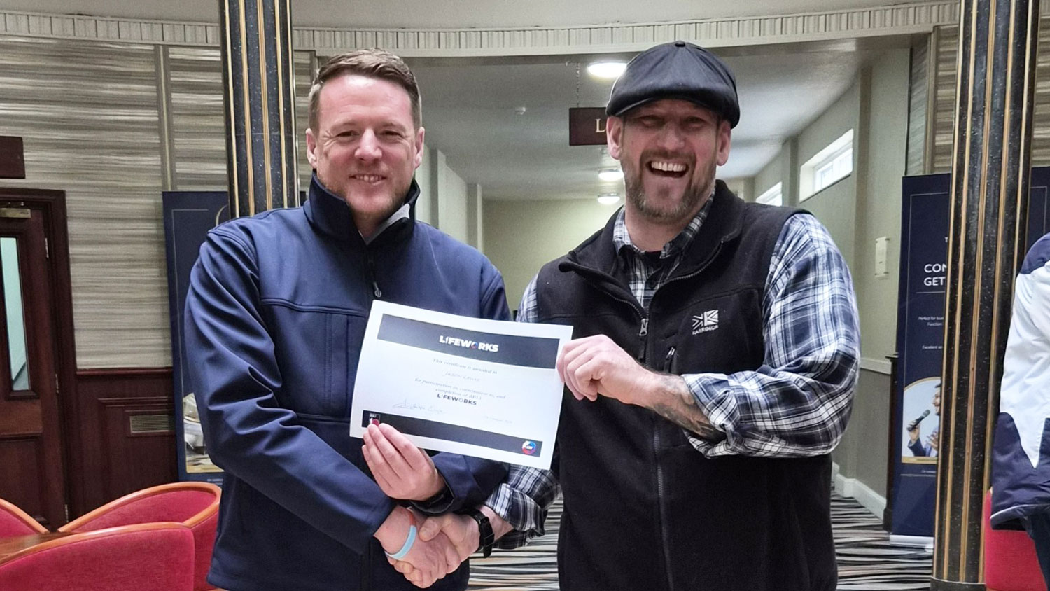 British Army veteran Lee Madigan pictured with a veteran in Portsmouth who he helped learn interview techniques