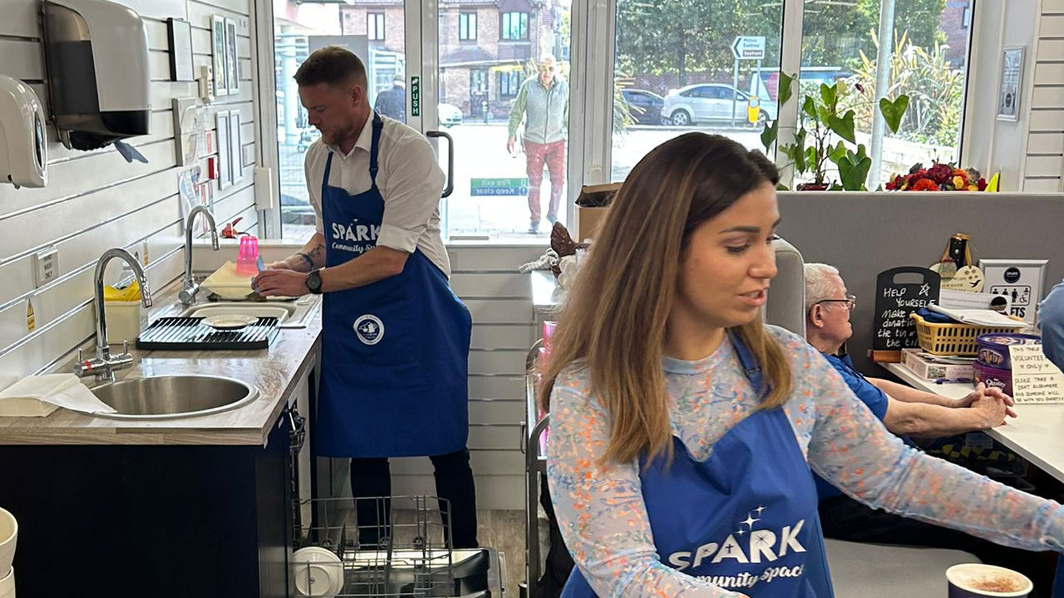 British Army veteran Lee Madigan volunteering in Portsmouth with an Inspire Futures Ltd colleague