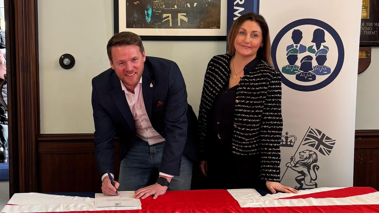 Lee Madigan, veteran turned Head of Veterans Division at Inspire Futures Ltd, signing the Armed Forces Covenant