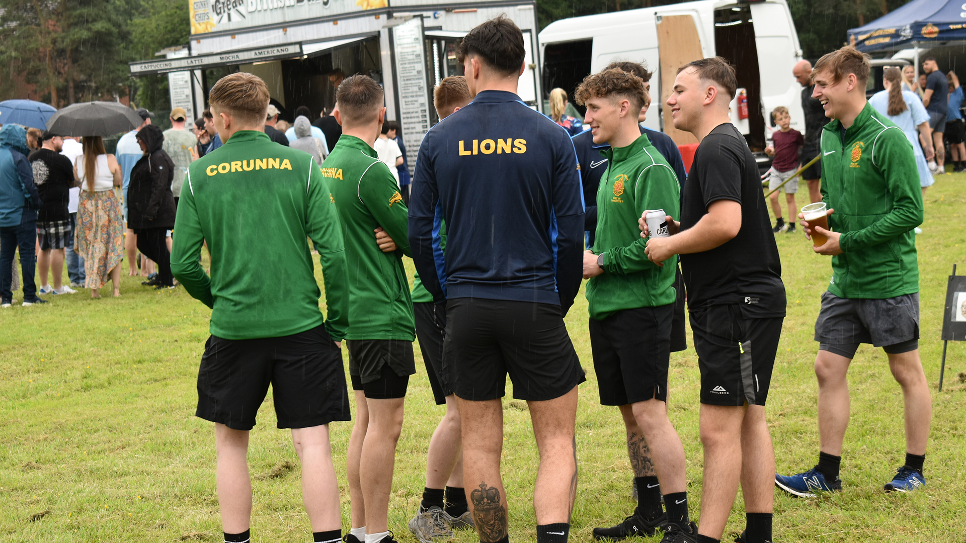Soldiers take a breather while taking part in the day's sporting activities