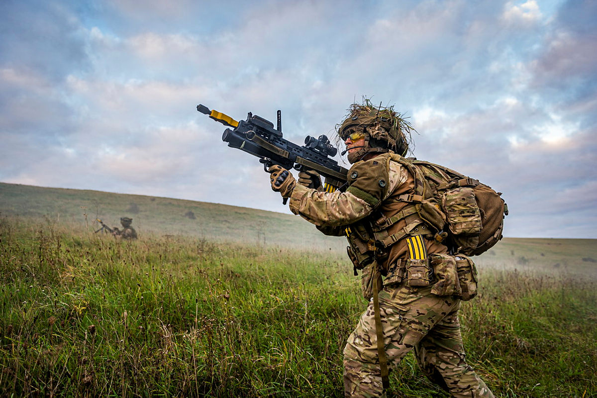 British Army soldiers with L85 and Underslung Grenade Launcher on training exercise