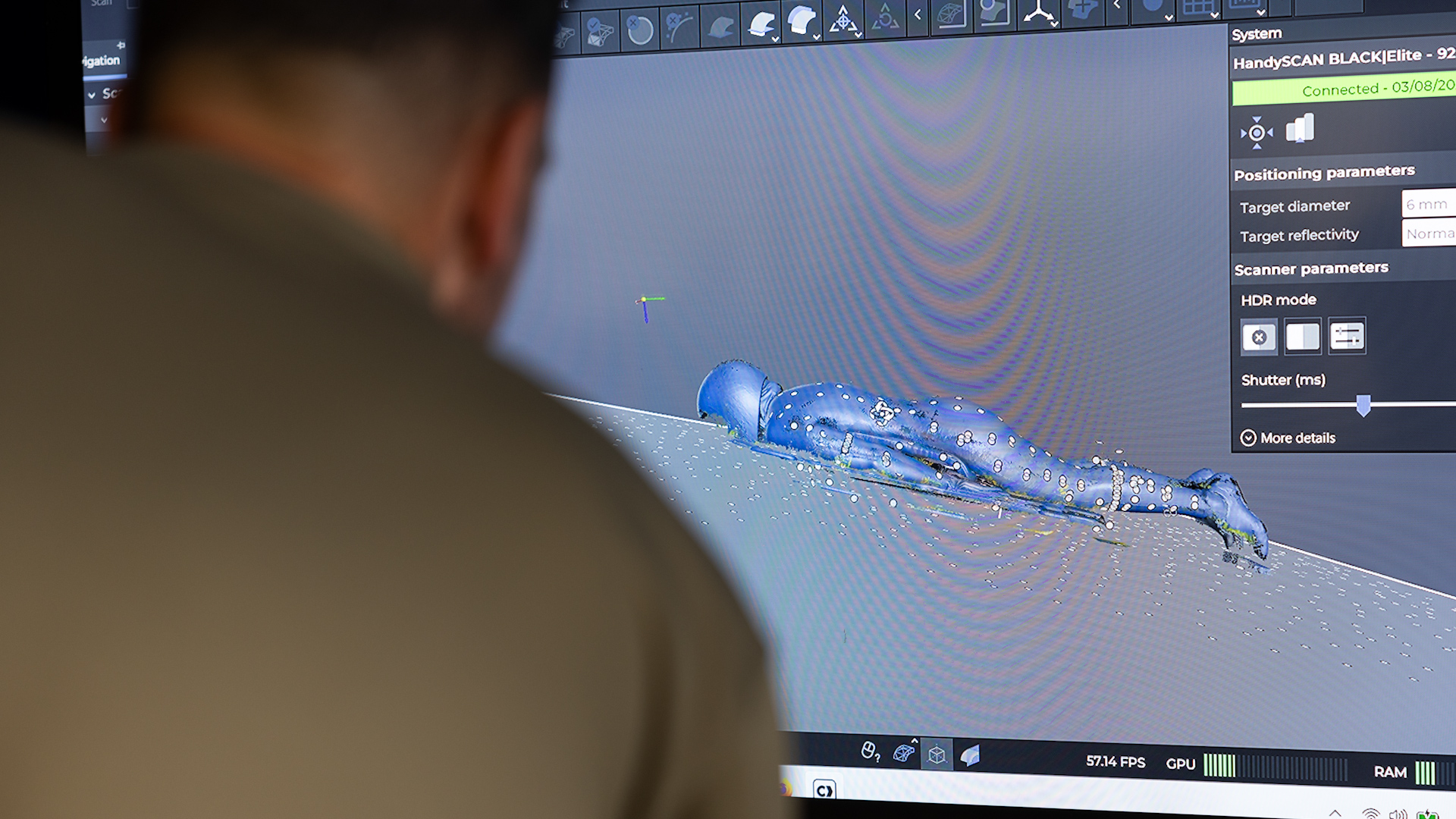 10082026 71IR engineer analysing 3D HandySCAN capture from Flt Lt Nicole Burger whilst positioned on her sled CREDIT RAF Whittering.jpg