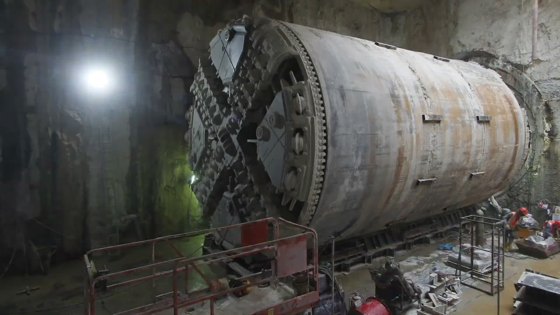 Massive drills are already used to create road and railway tunnels, but firms like GE Research are attempting to use smaller robots that can plot and cut a route themselves (Picture: BFBS)