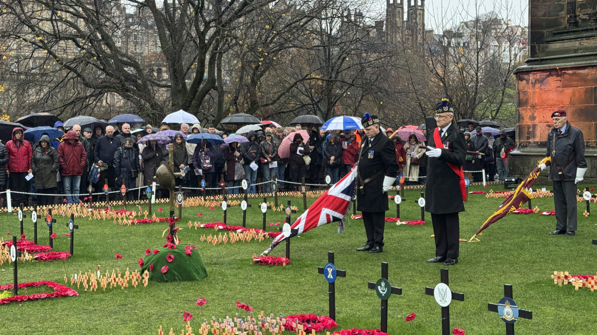 Crowds amassed in the heart of Edinburgh for a service in the Garden of Remembrance beside the Scott Monument