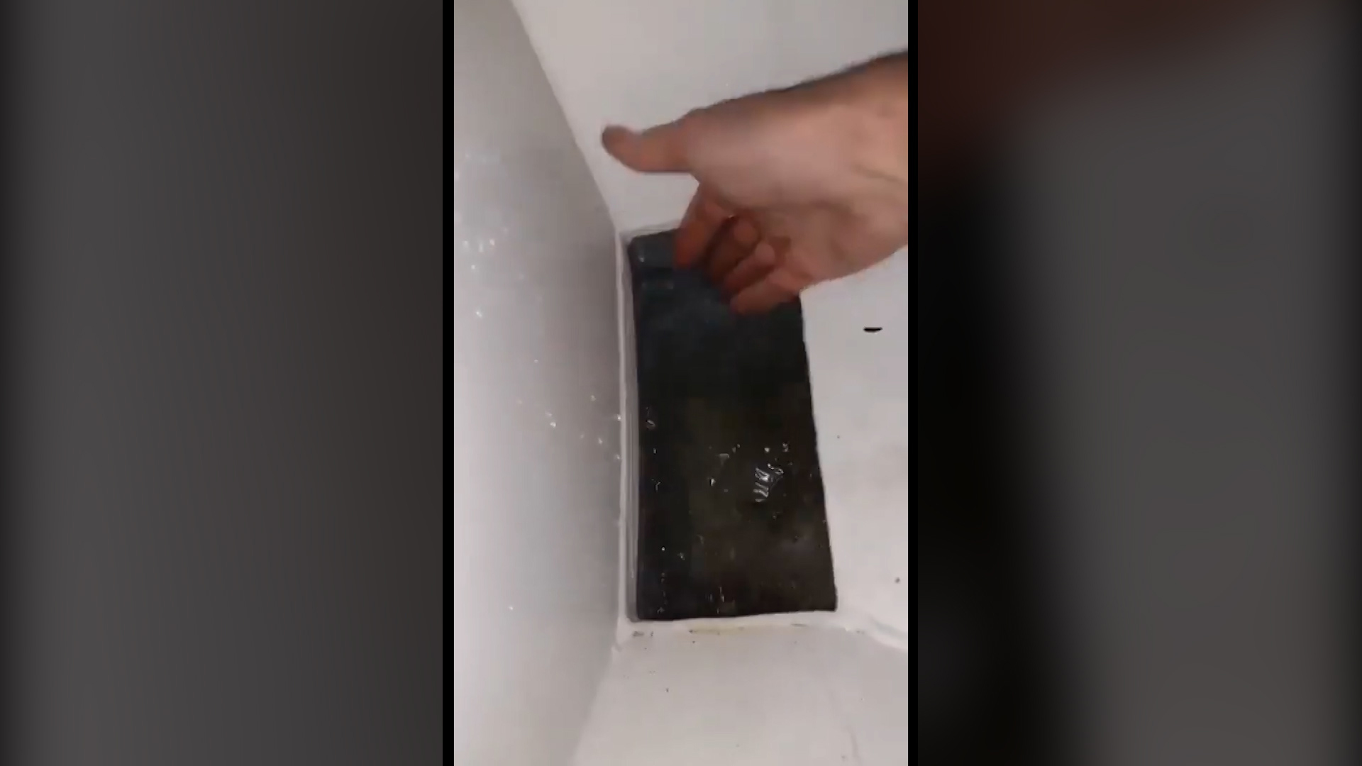 This appears to show water collected inside the vehicle rather than having drained away