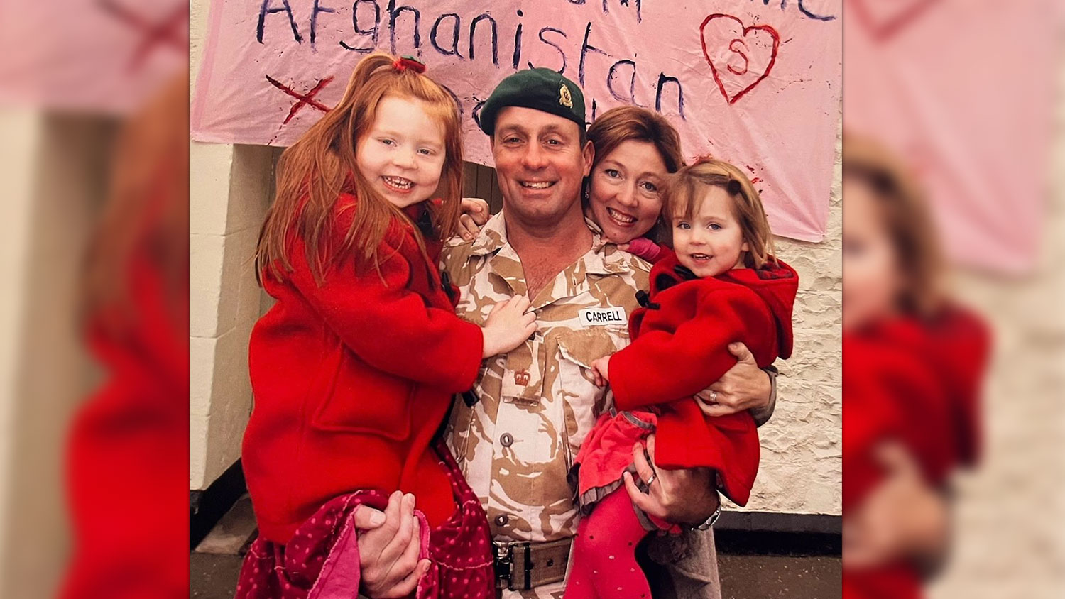 Jilly Carrell with her late husband Col Nick Carrell and their daughters Scarlett and Beatrice the day he returned from Afghanistan (Picture: Carrell family)