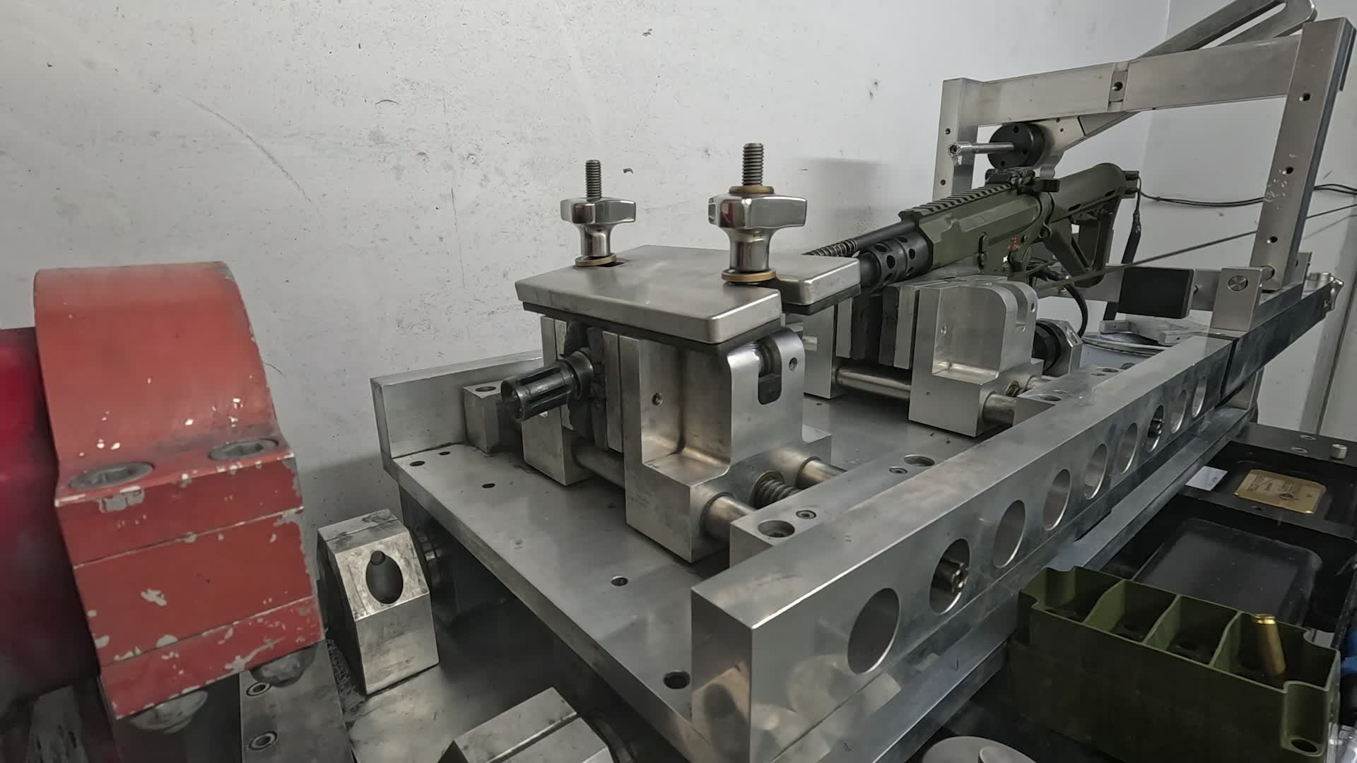 The weapon is clamped onto a test bed before an overpressured round is fired to ensure the rifle holds up and there is no catastrophic failure (Picture: BFBS)