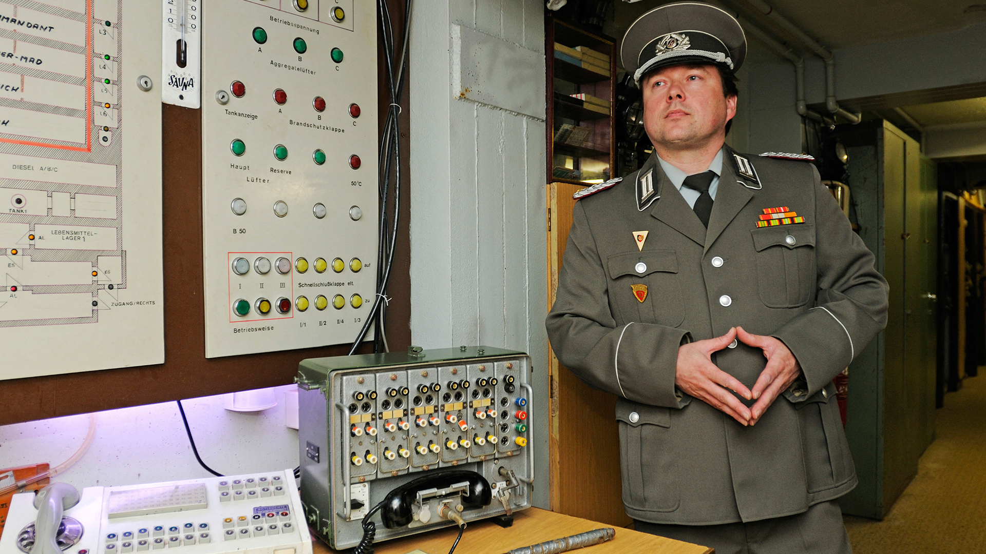 While West Germany tried to shake off its Nazi past, East Germany had no qualms about creating an effective and intrusive state security organisation in the shape of the Stasi - this man, however, is merely a guide at the Stasi museum (Picture: Alamy)