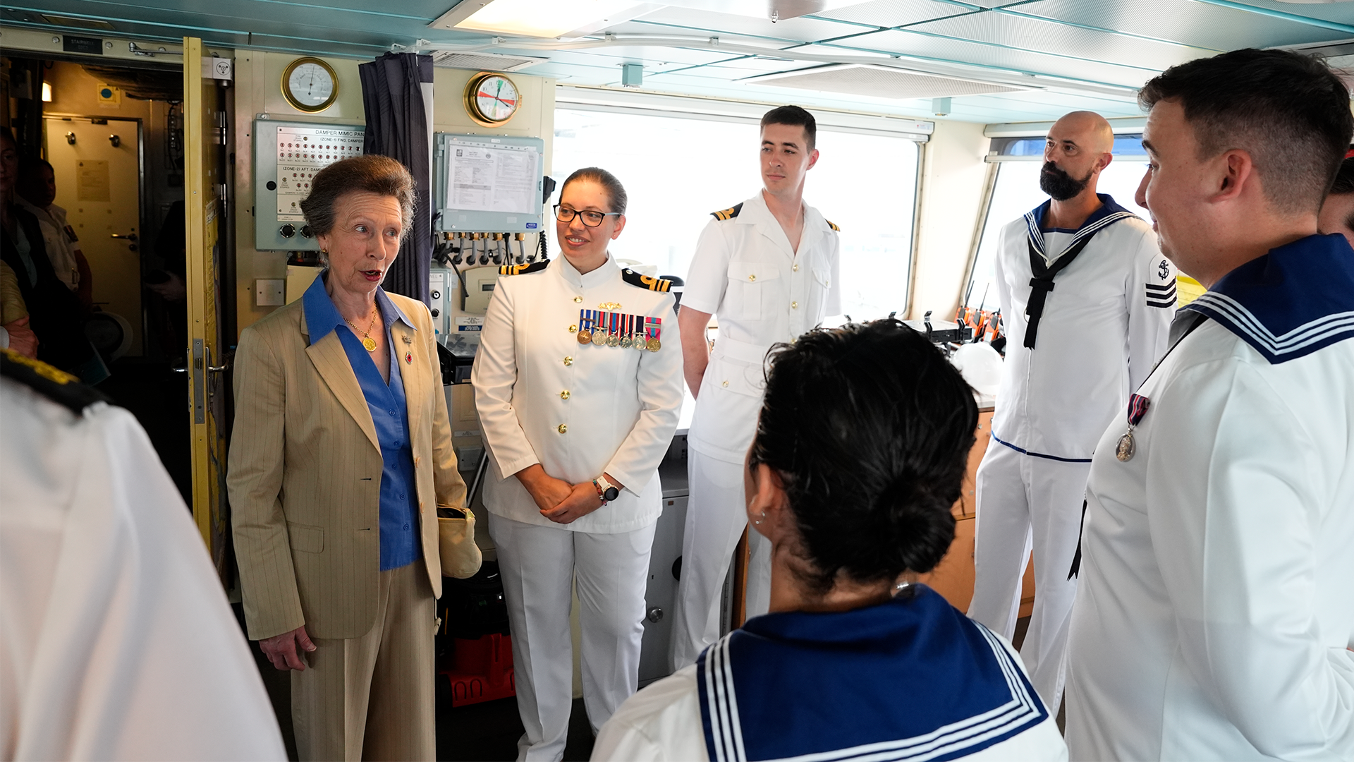 12112025 The Princess Royal meet the crew on the bridge during a tour of HMS Spey CREDIT PA