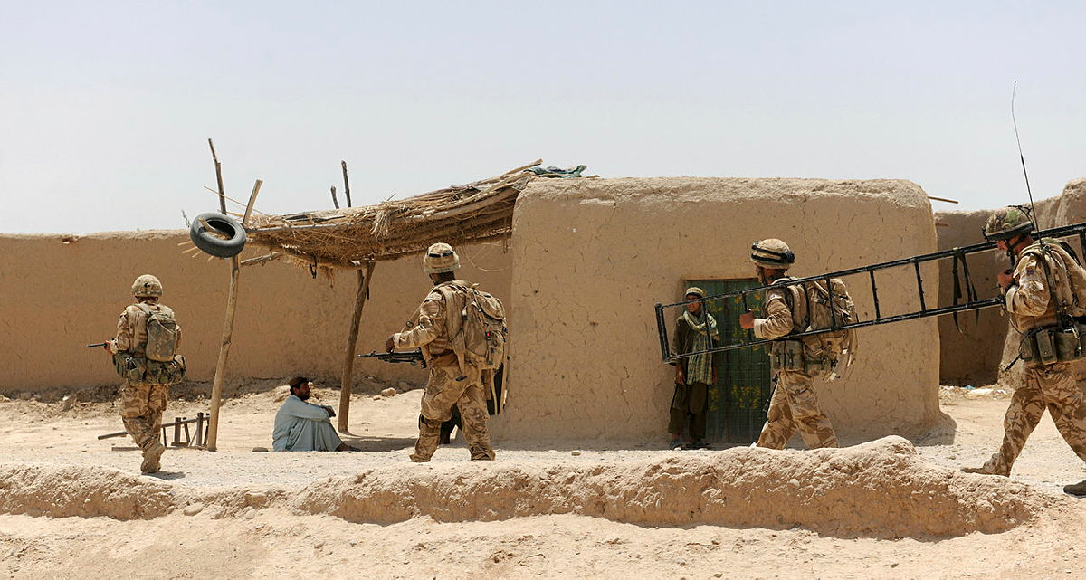 121225 soldiers from the 2nd Battalion Royal Welsh patrol through Babaji during Operation Panther’s Claw in July 2009 CREDIT MOD