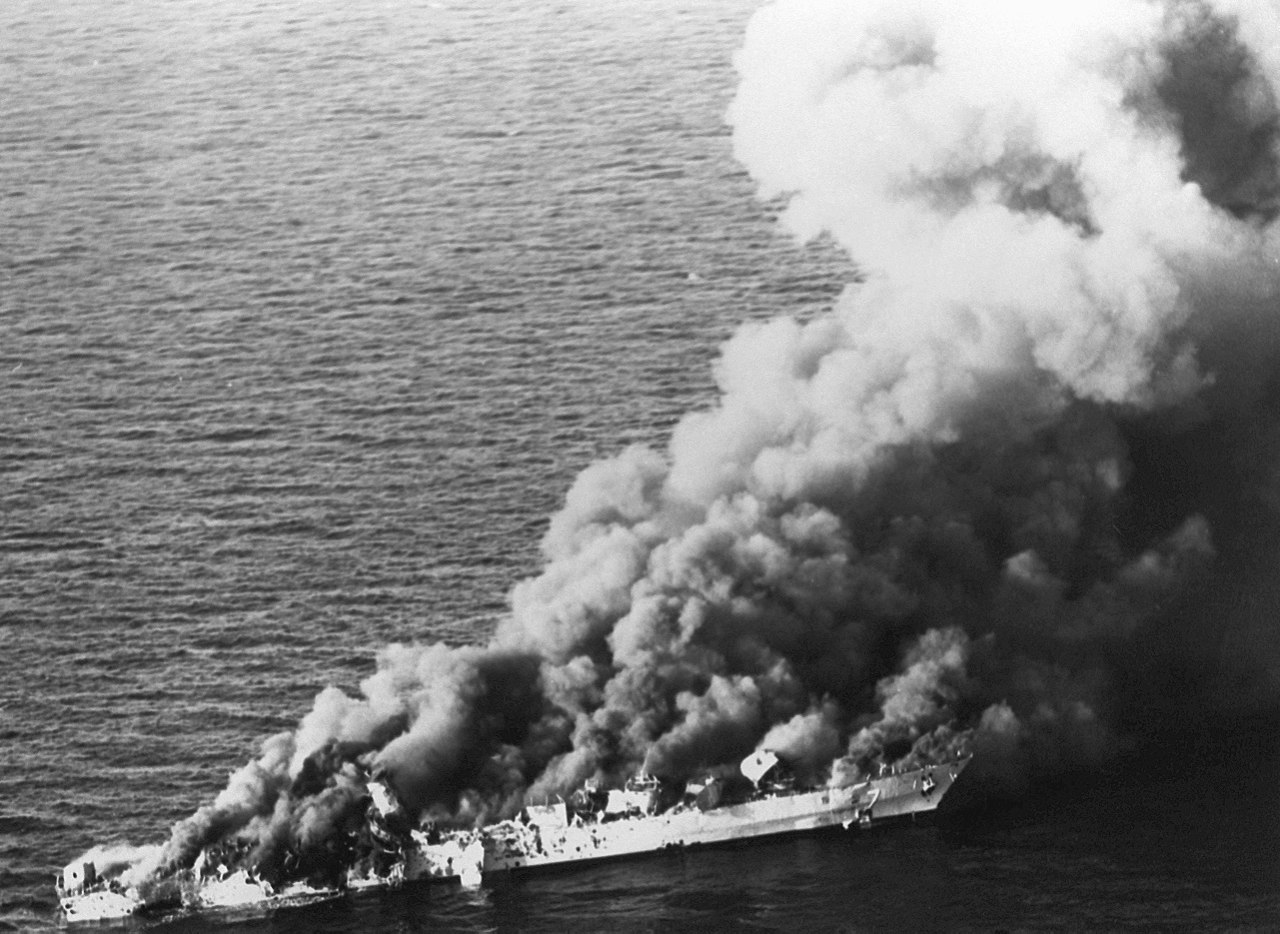 Iranian frigate Sahand on fire before sinking. (Image: US Navy)