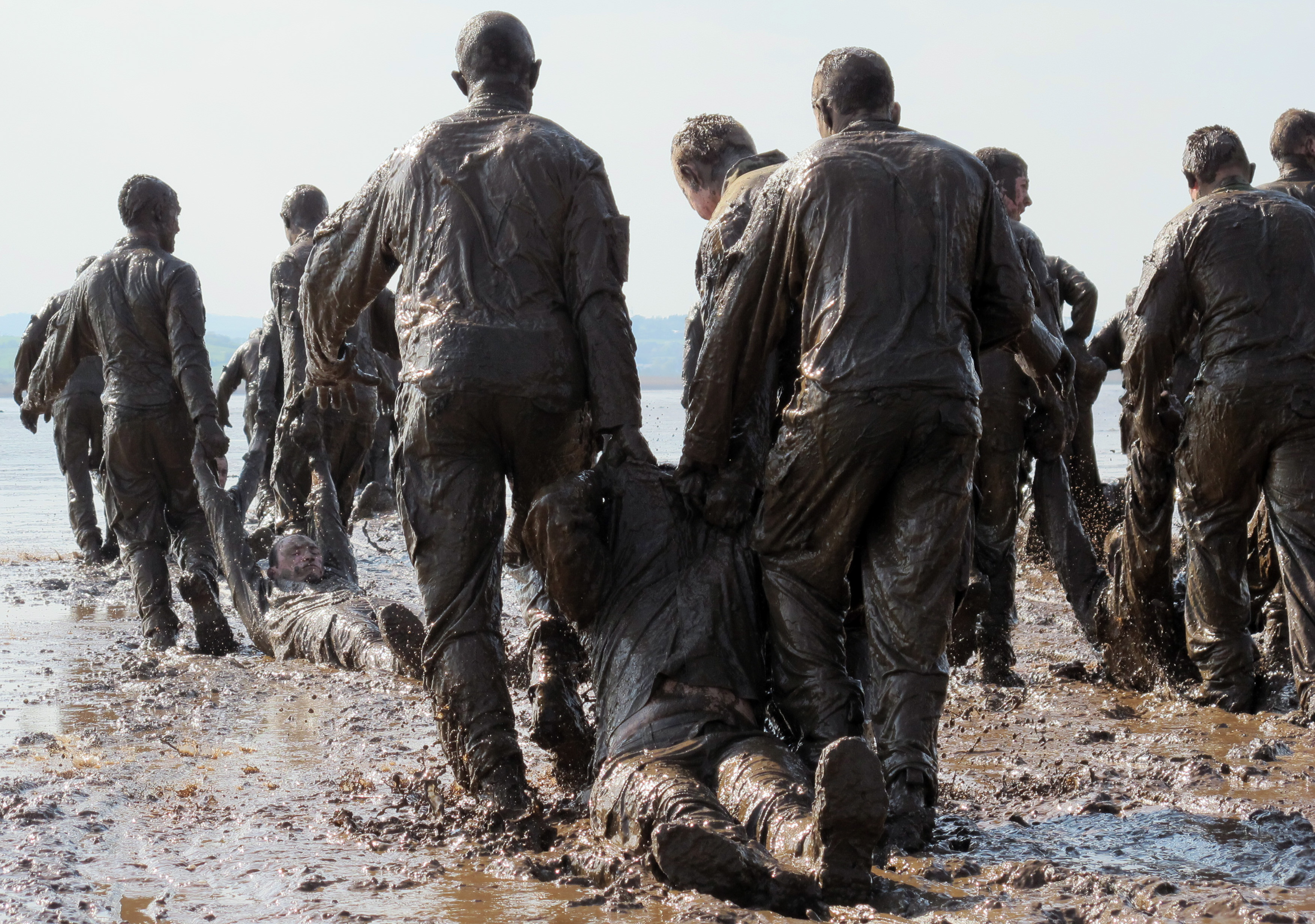 Royal Marines during a 'mud run' at Lympstone. Credit: Richard White, Crown Copyright