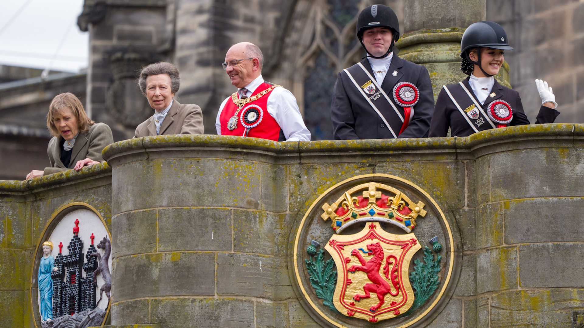 Princess Anne on the Mercat Cross in Edinburgh alongside the Lord Provost, Edinburgh Riding of the Marches Captain Lance Corporal Adam Geehamand Edinburgh Lass Kirsten Lees