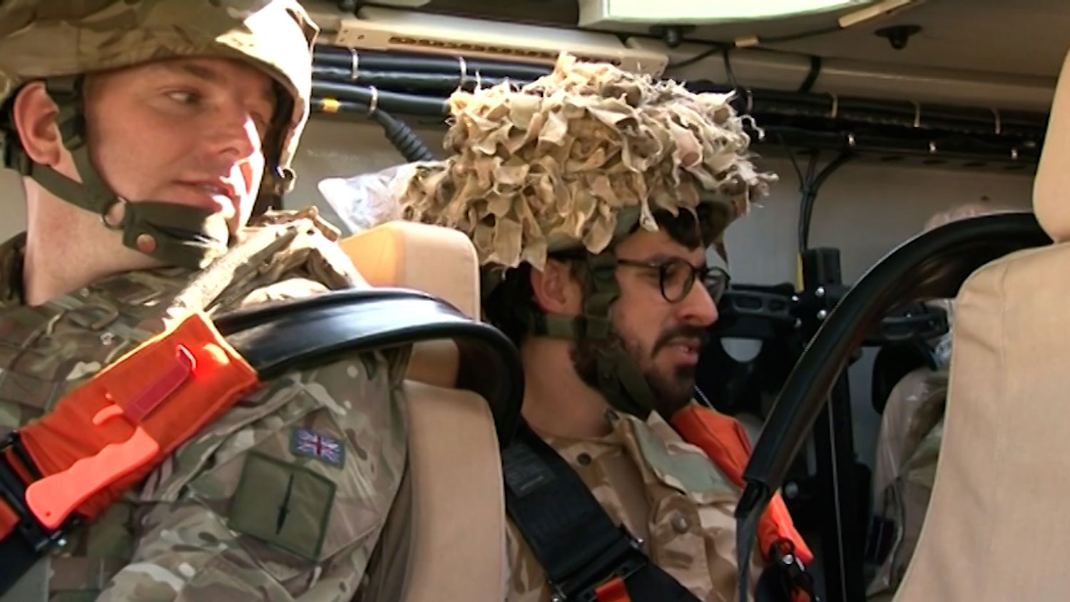 141025 The Inbetweeners actor Simon Bird sitting in a Foxhound in November 2014 CREDIT