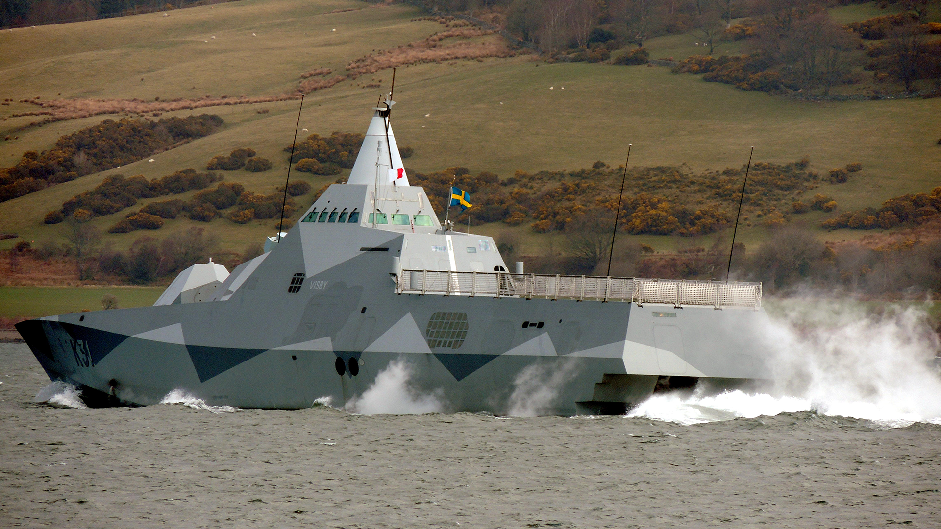 15042013 HSwMS Visby K31, a Visby-class corvette operated by the Swedish Royal Navy, passing Greenock at the start of Exercise Joint Warrior 13 1 Image ID RCDMW2 CRED ALAMY