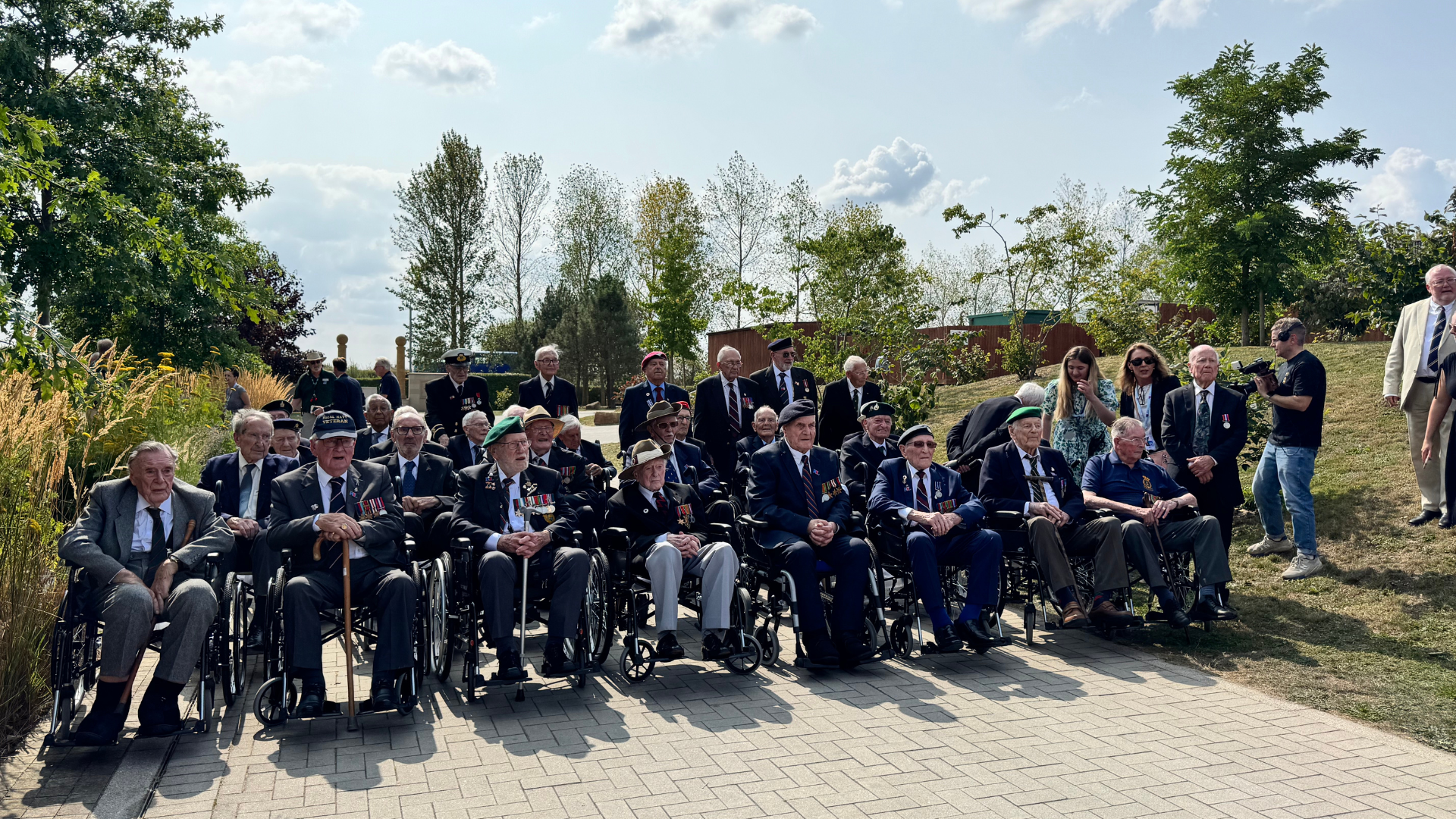 All 33 veterans at the ceremony at the National Memorial Arboretum gathered for a poignant photograph