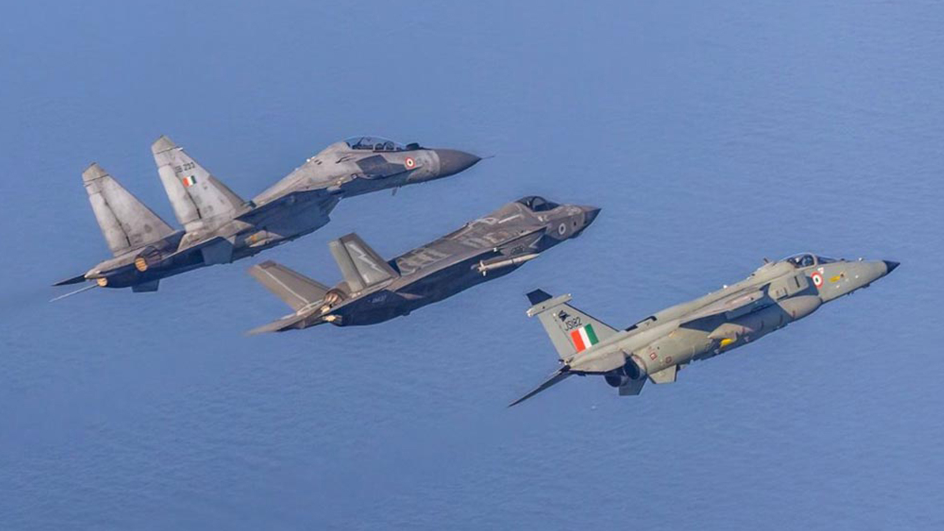 At the end of mock hostilities, a British F-35B is flanked by an Su-30MKI and a Jaguar