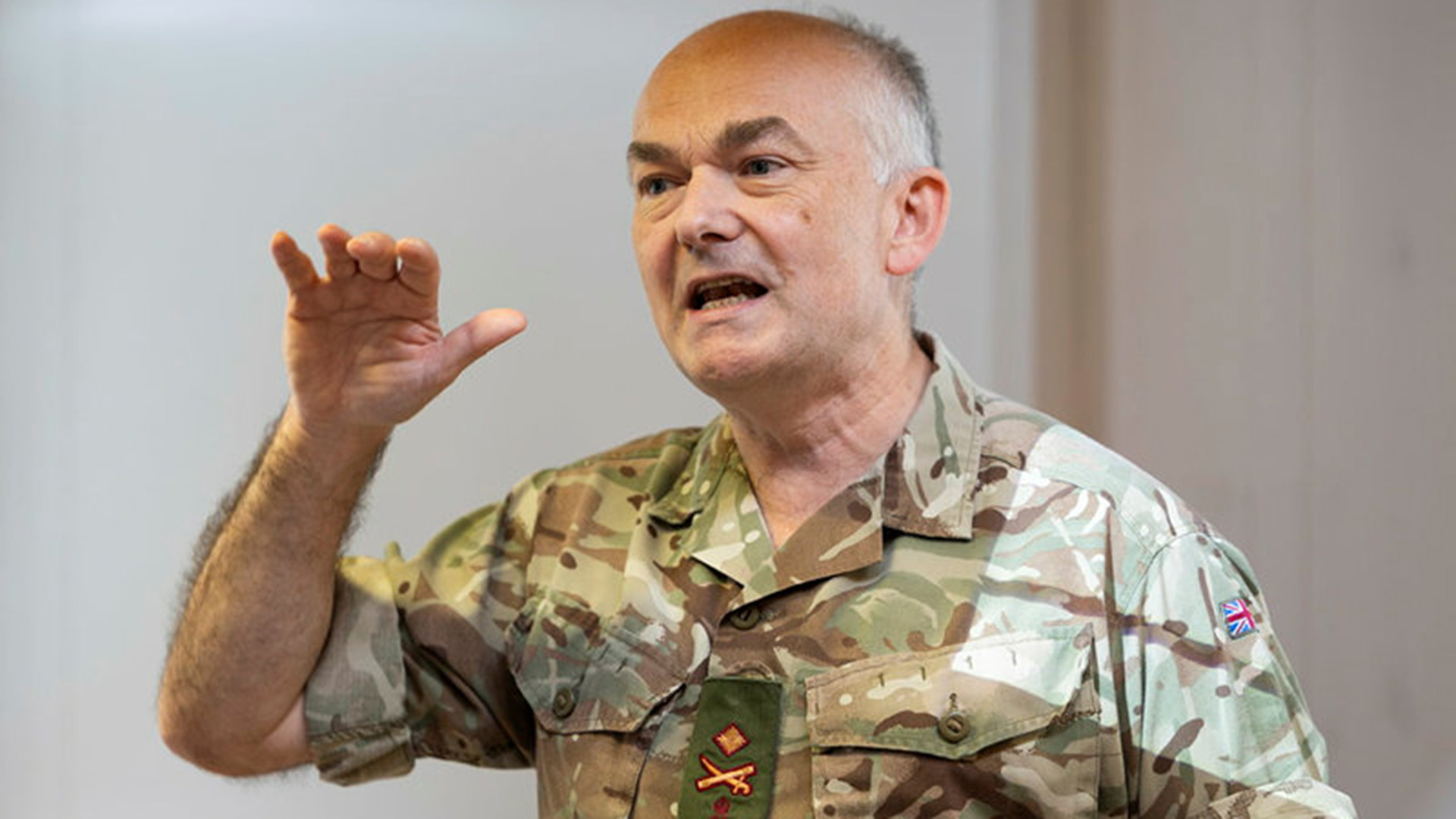 Major General Phil Carter, Surgeon General, speaking at the wargame (Picture: MOD)