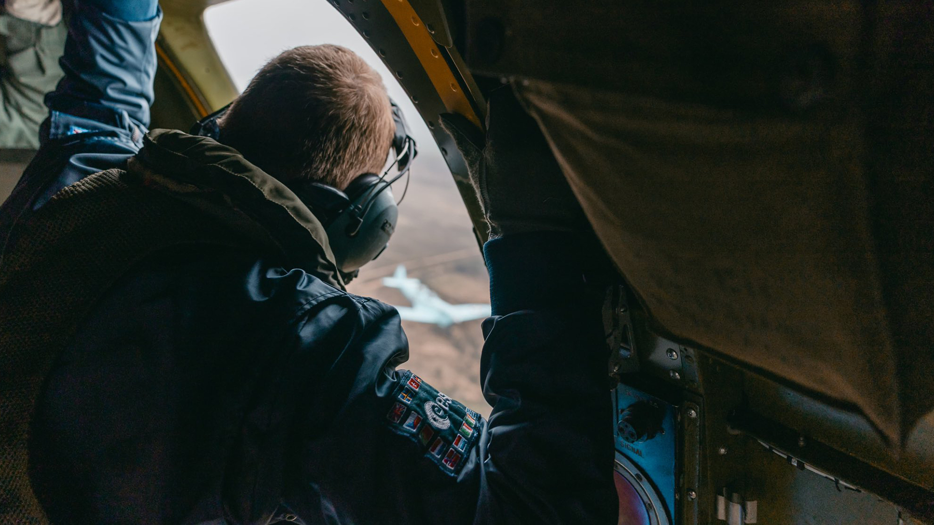 Former astronaut Tim Peake looks down at the Spit, not from the International Space Station, but from the BBMF's Dakota (Picture: MOD)