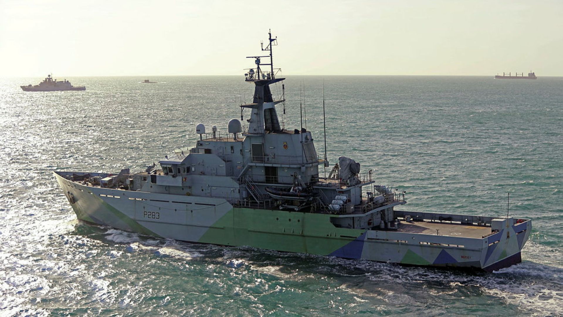 HMS Mersey (foreground) monitored Admiral Grigorovich (left) and Kilo-class submarine the Krasnodar (centre-left) March 29 and April 7 (Picture: MOD)