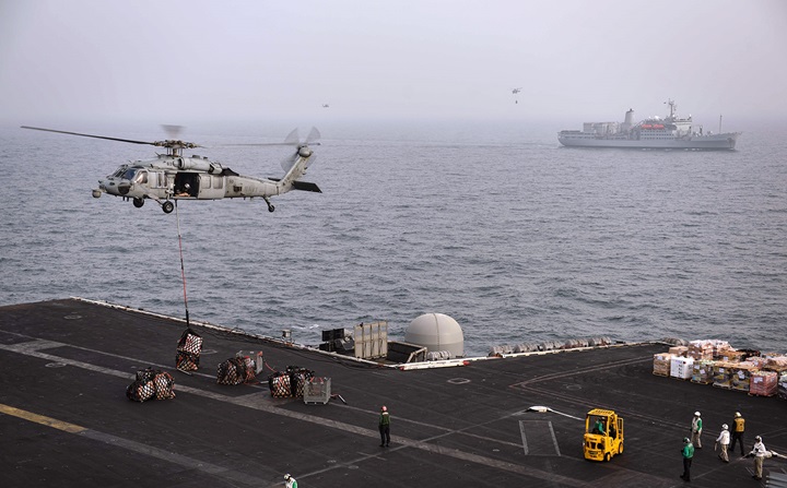 MH-60S Sea Hawks deliver supplies to USS Theodore Roosevelt